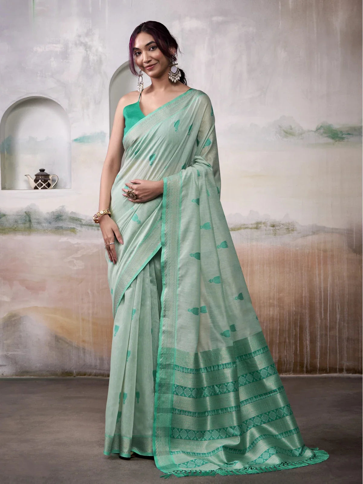 Tarani green modal cotton saree with zari border and pallu elegant full view