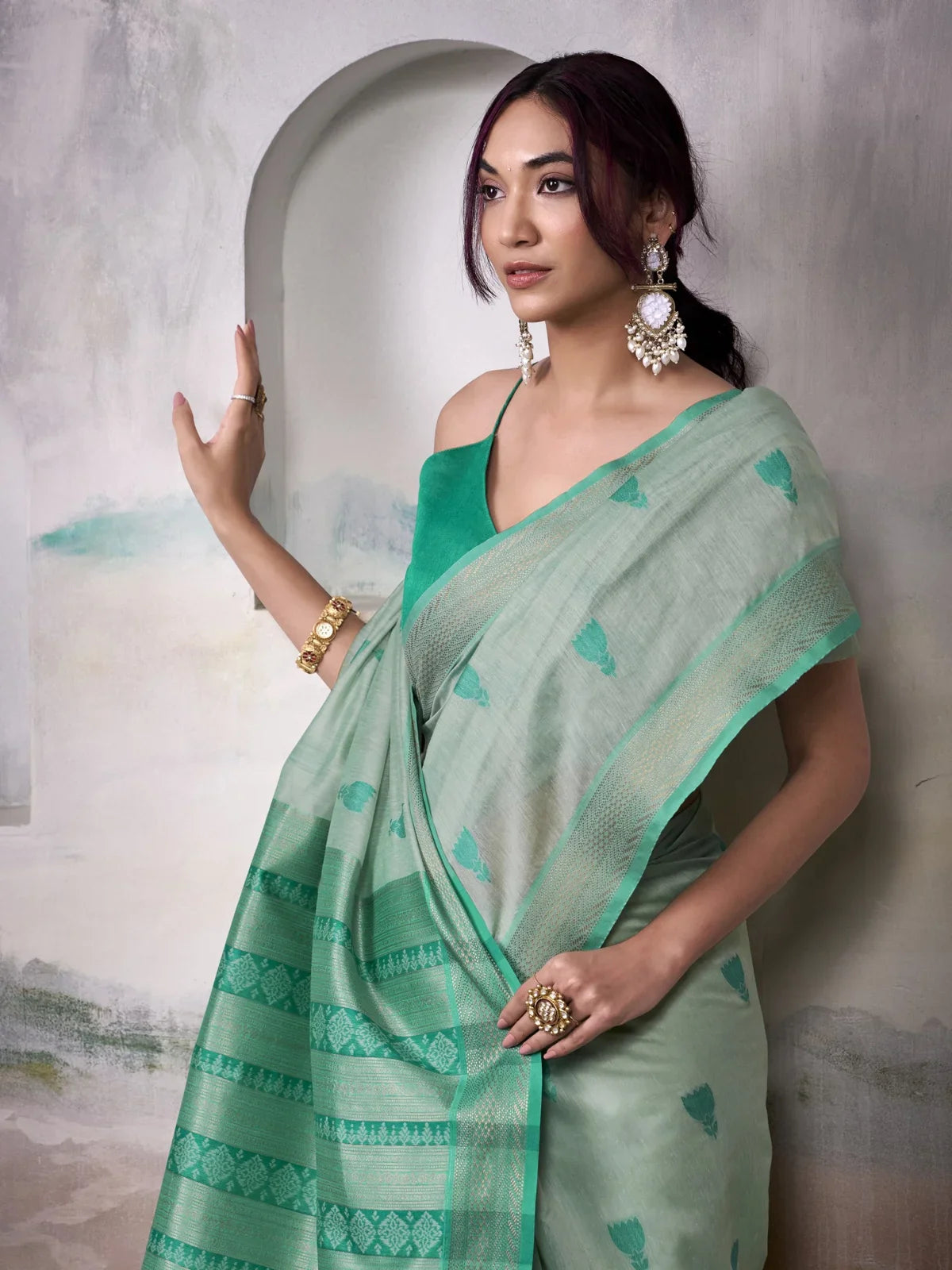 Tarani green modal cotton saree close upper body view highlighting zari border
