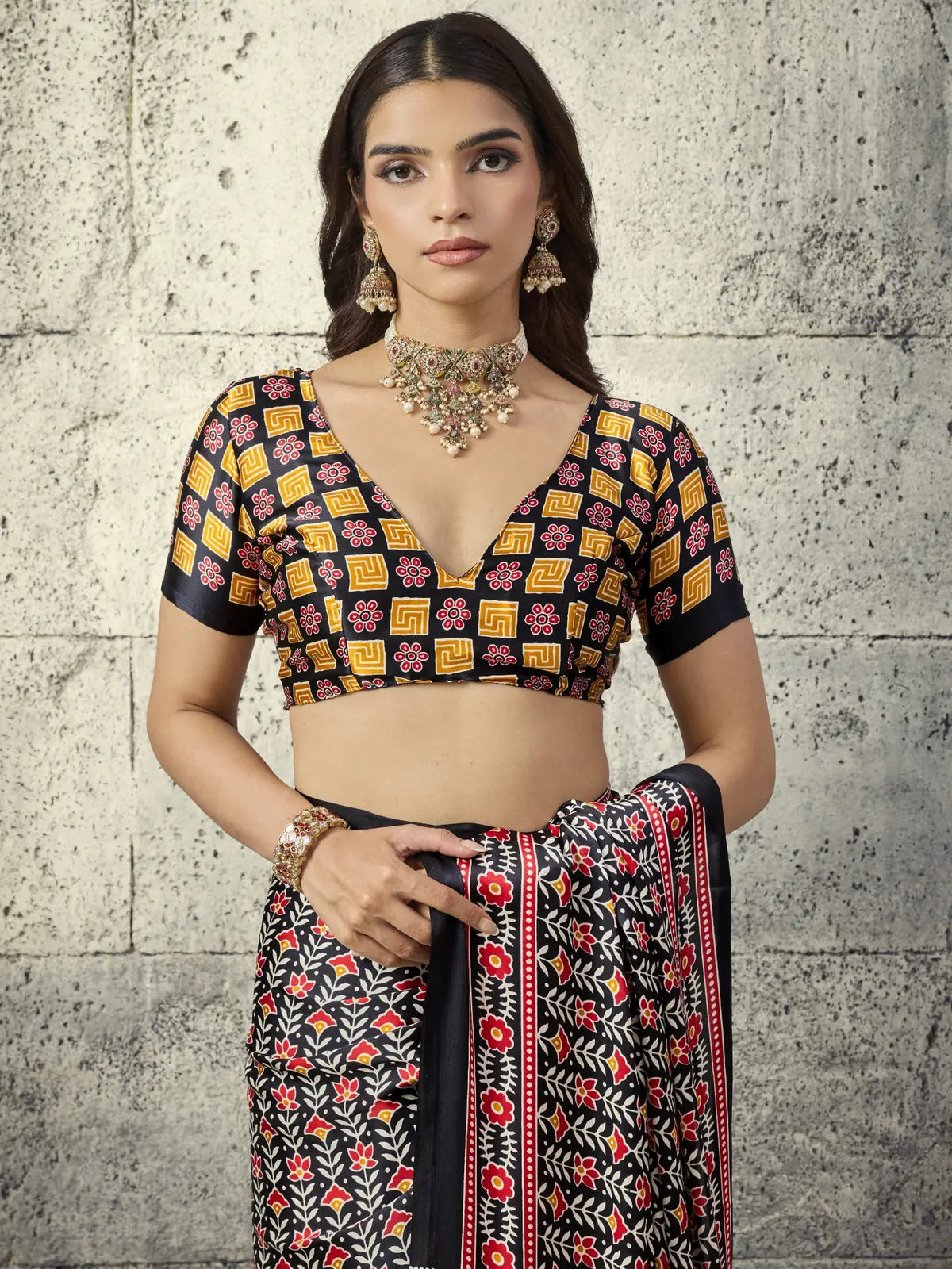 Tarani Nayana black Modal Satin Ajrakh print saree upper body view showing blouse design and border details