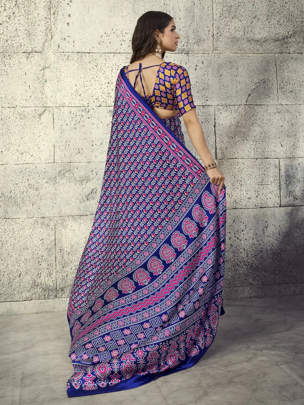 Tarani Nirmita blue Modal Satin Ajrakh Print Saree back view showcasing pallu flow and blouse back design
