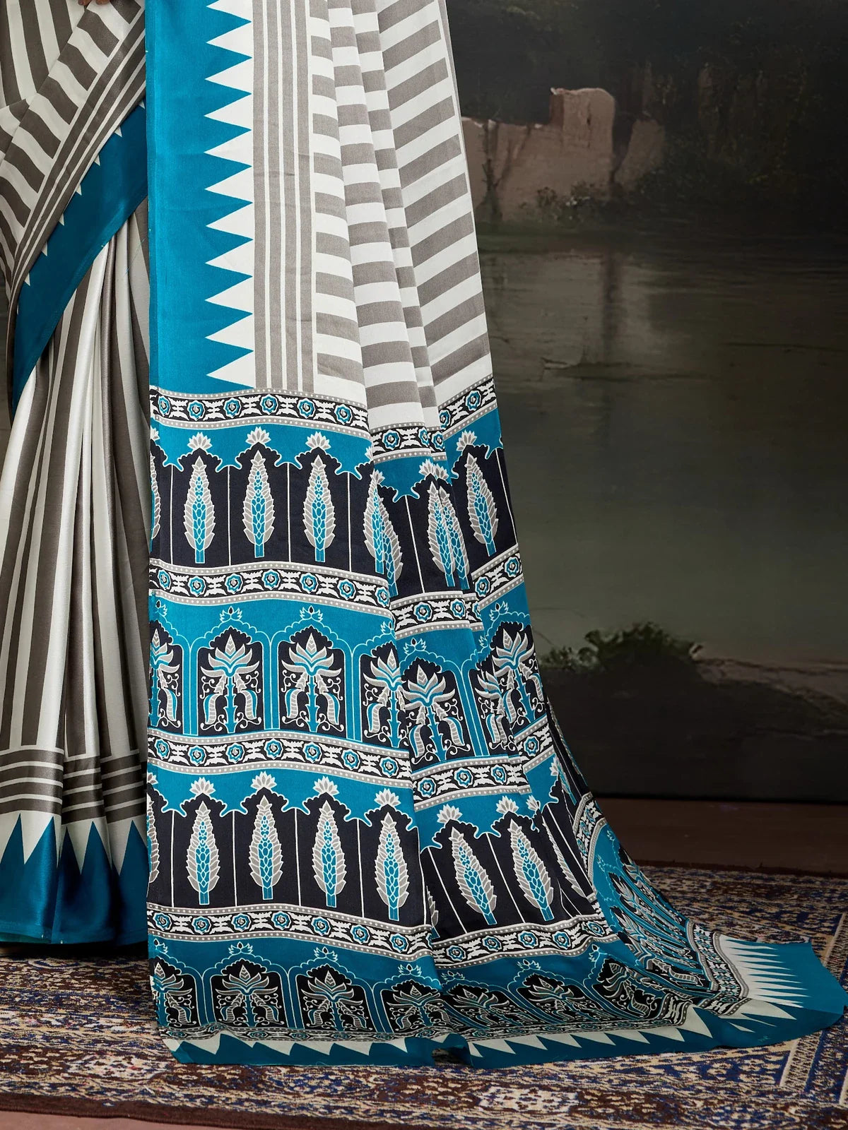 Tarani blue modal satin saree pallu view with intricate ajrakh border and print