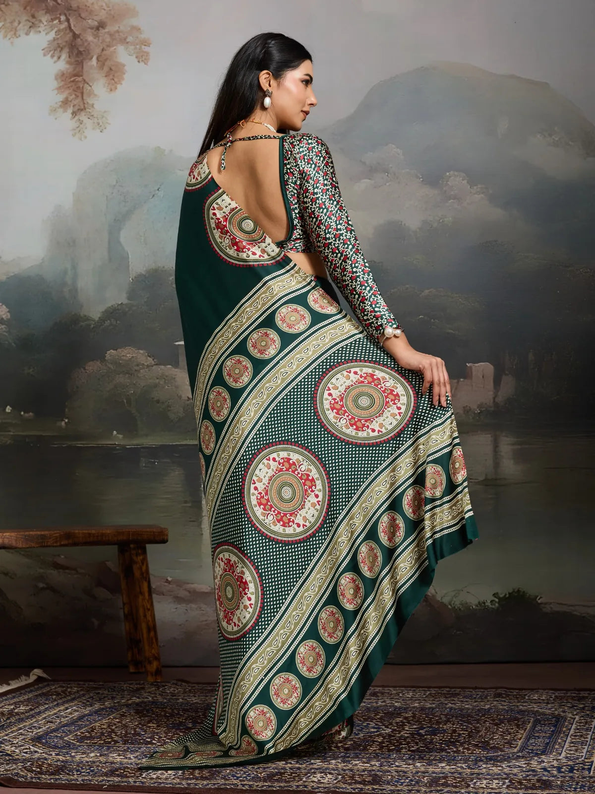 Tarani green modal satin saree back view showing drape and blouse design - Hridyanshi