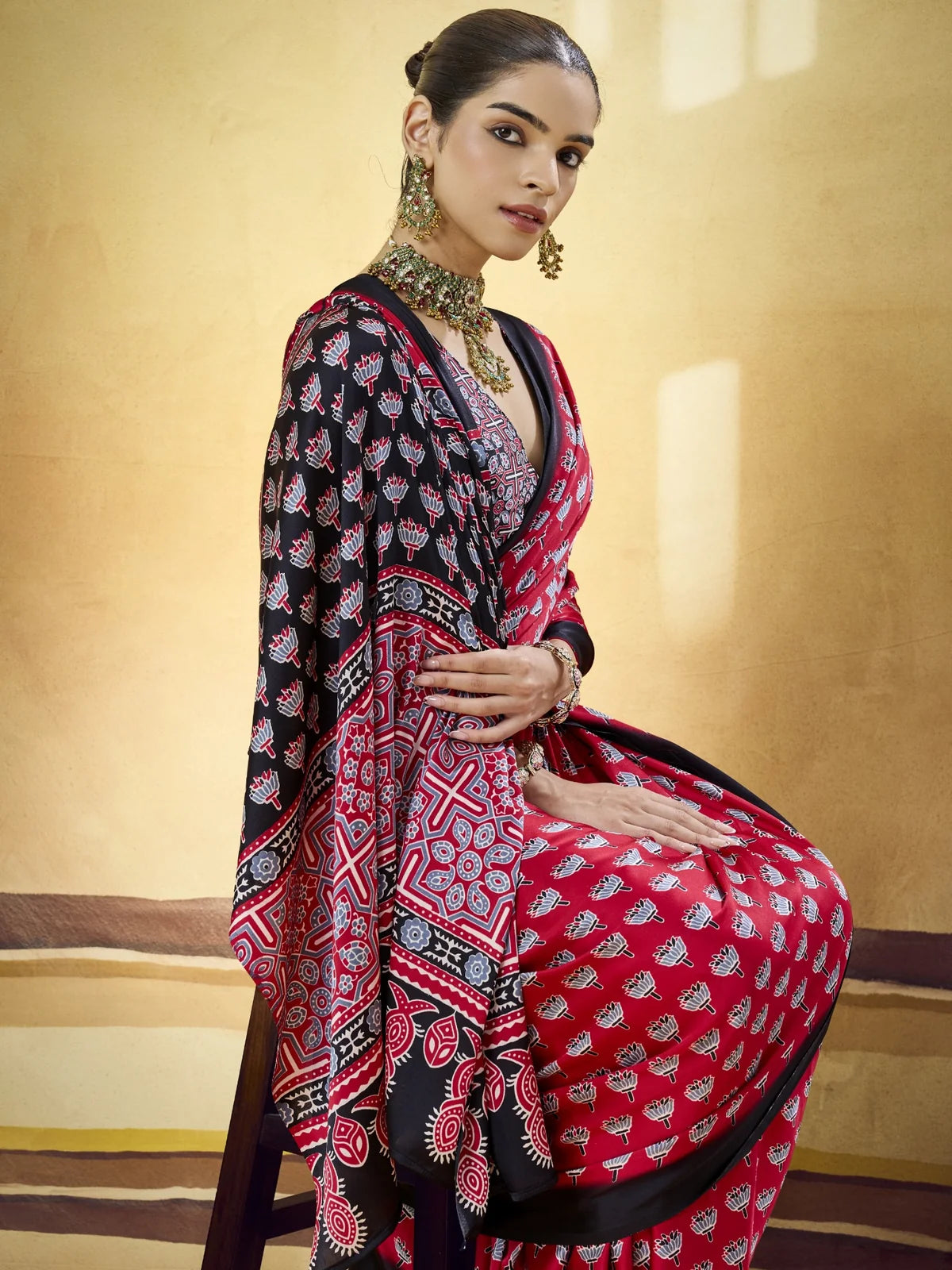 Tarani maroon Modal Satin Ajrakh Print saree side view highlighting drape and pallu