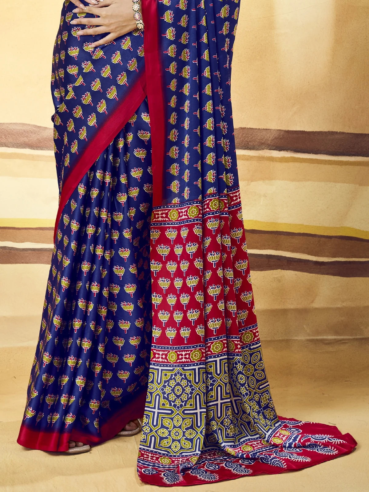 Tarani pallu view of navy blue Modal Satin Ajrakh Print saree with printed border