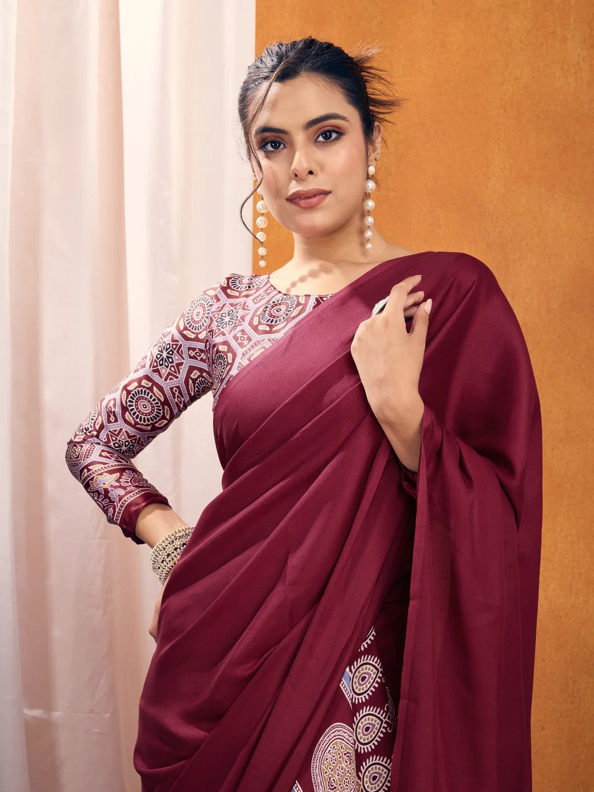 Tarani maroon Ajrakh saree upper body view showing printed blouse and soft drape