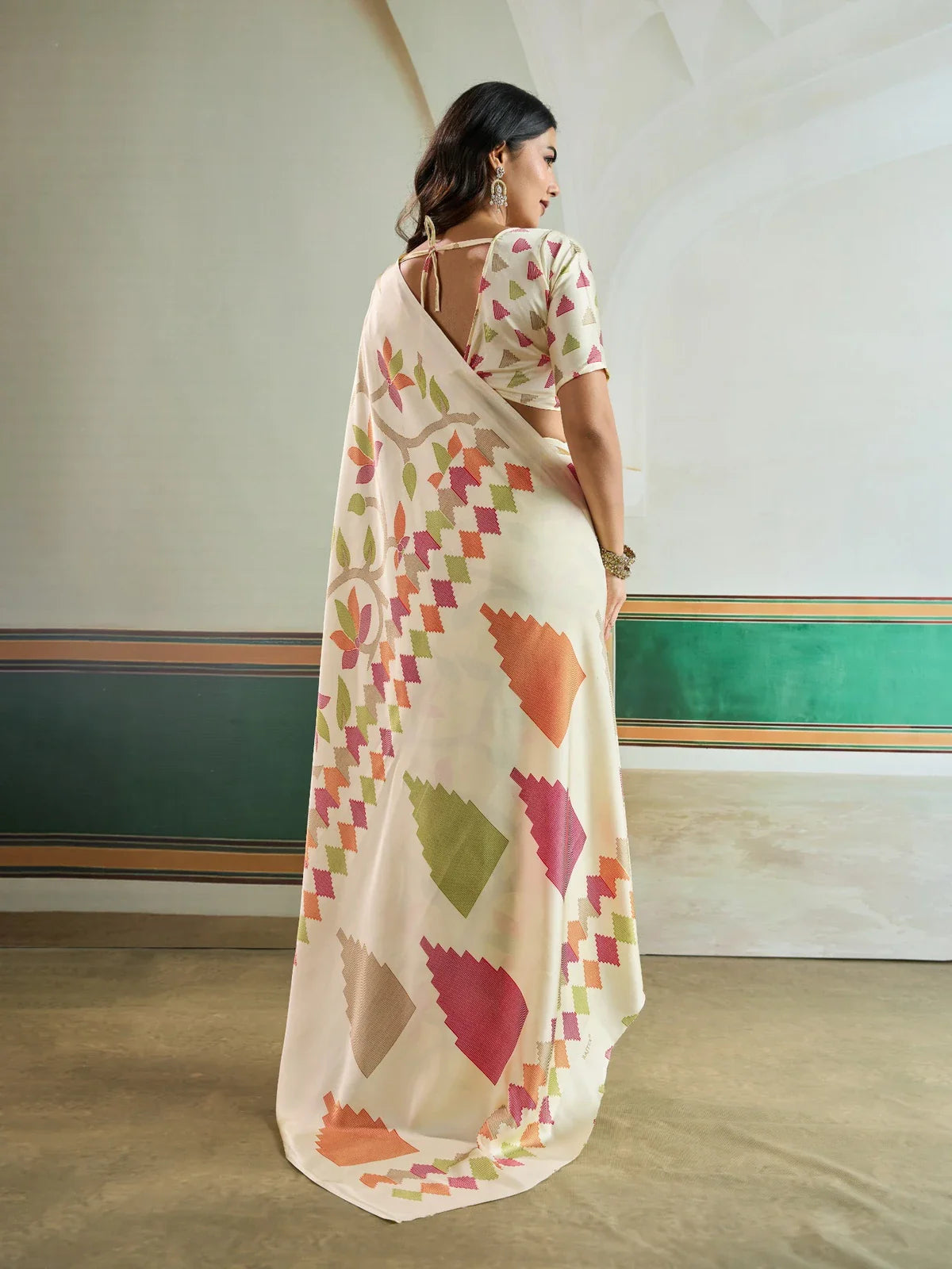 Tarani back drape view highlighting the fall and design of the modal satin saree