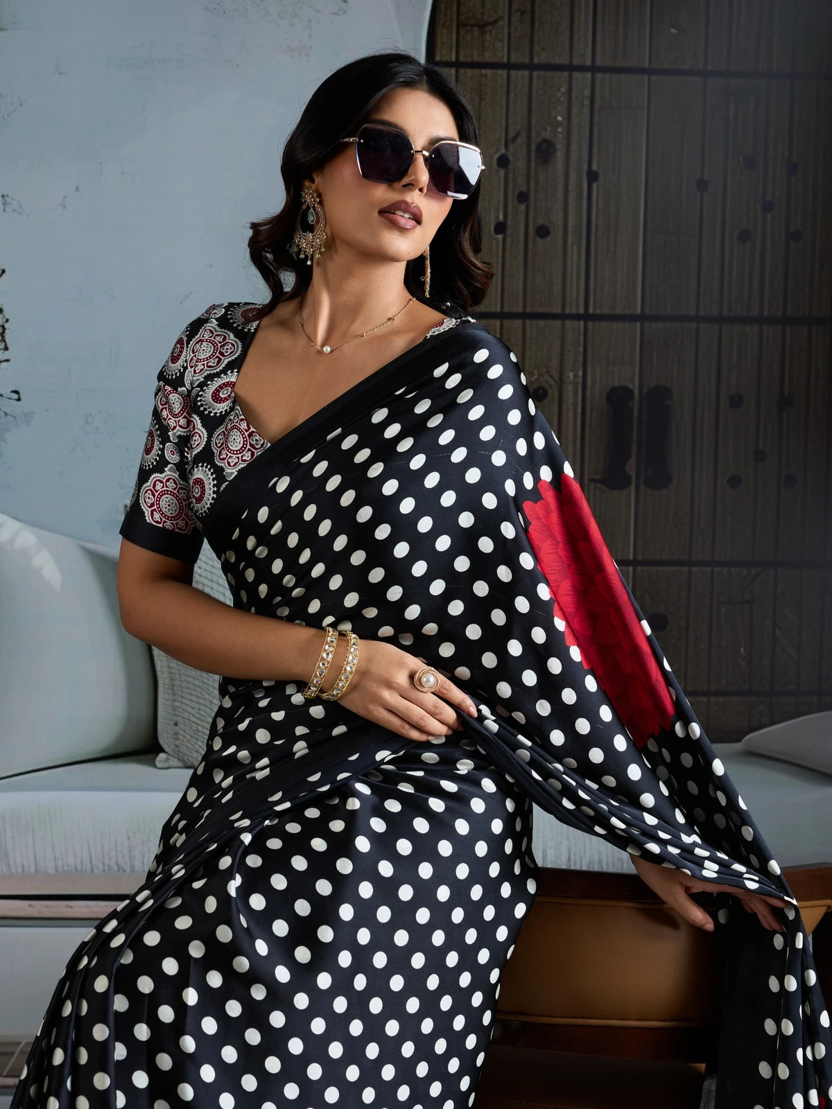 Tarani black modal satin Ajrakh print saree closeup with polka dot drape and floral pallu