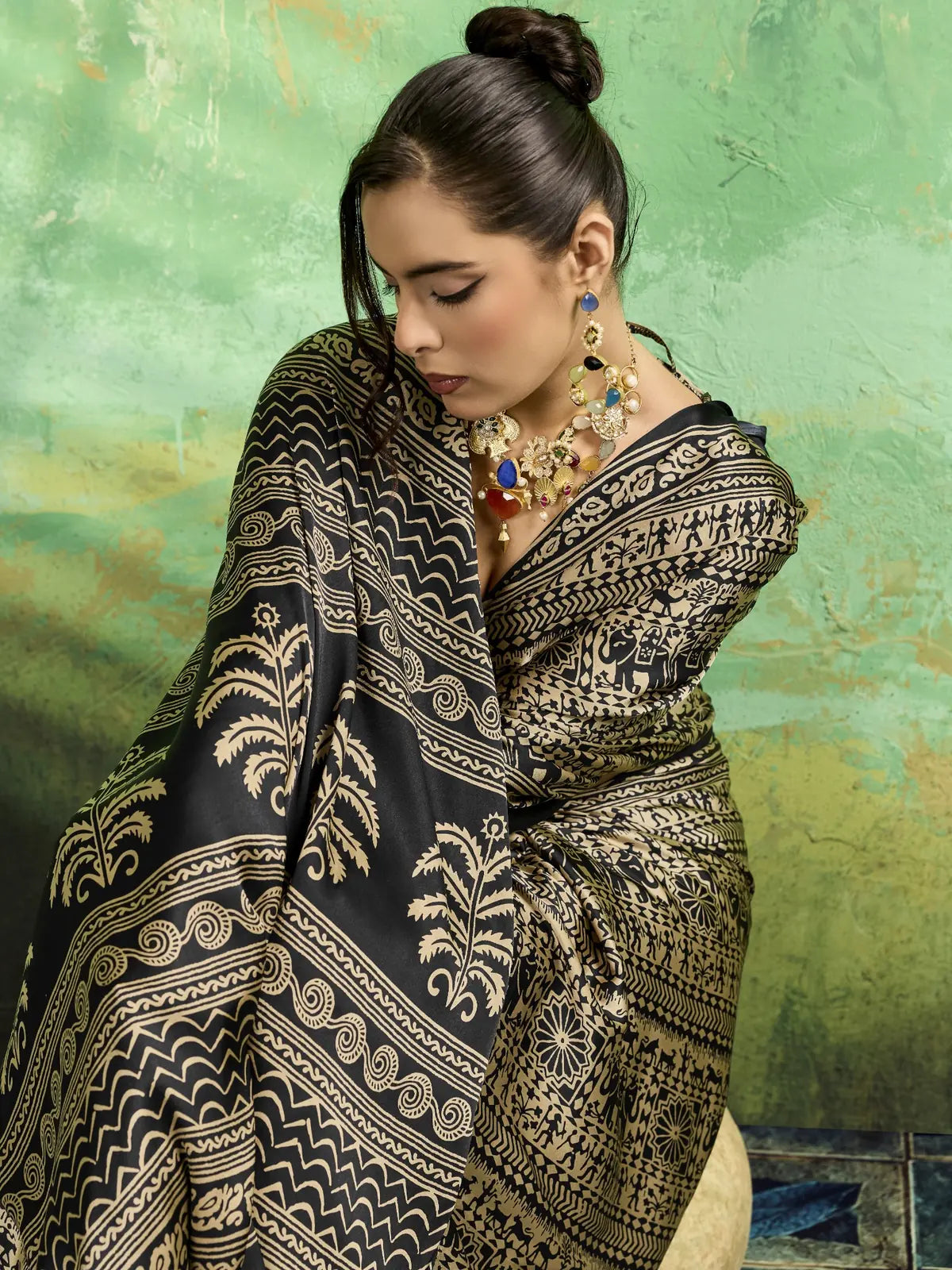 Tarani black Modal Satin Ajrakh Print saree closeup view of printed pallu and detailing