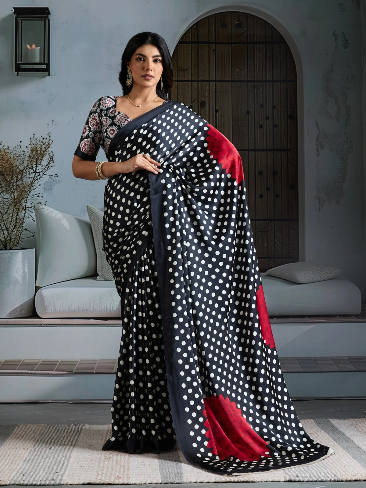 Tarani black modal satin Ajrakh print saree with polka dots and floral pallu full front view