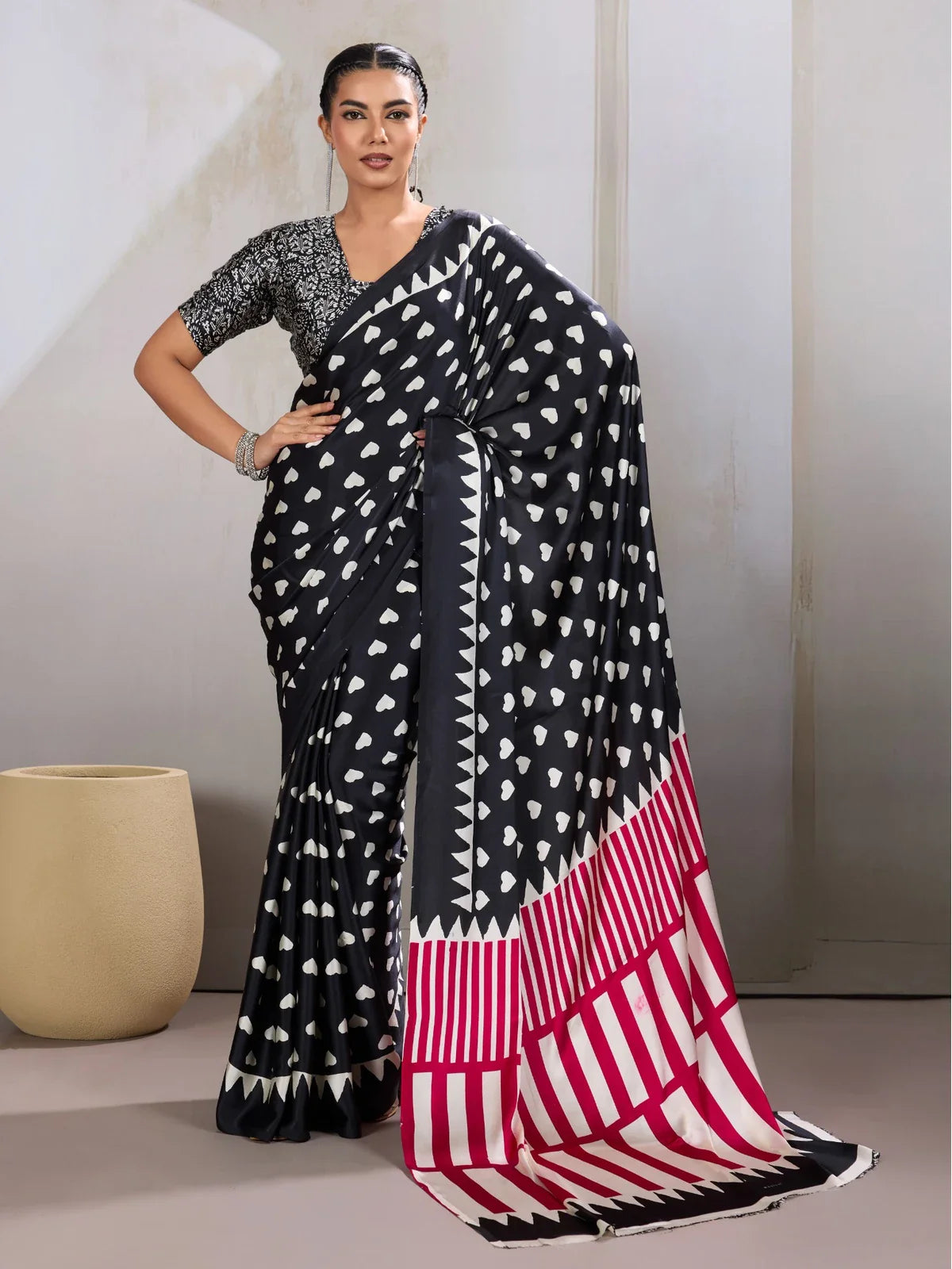 Tarani black modal satin saree with white heart motifs and magenta striped pallu front full view