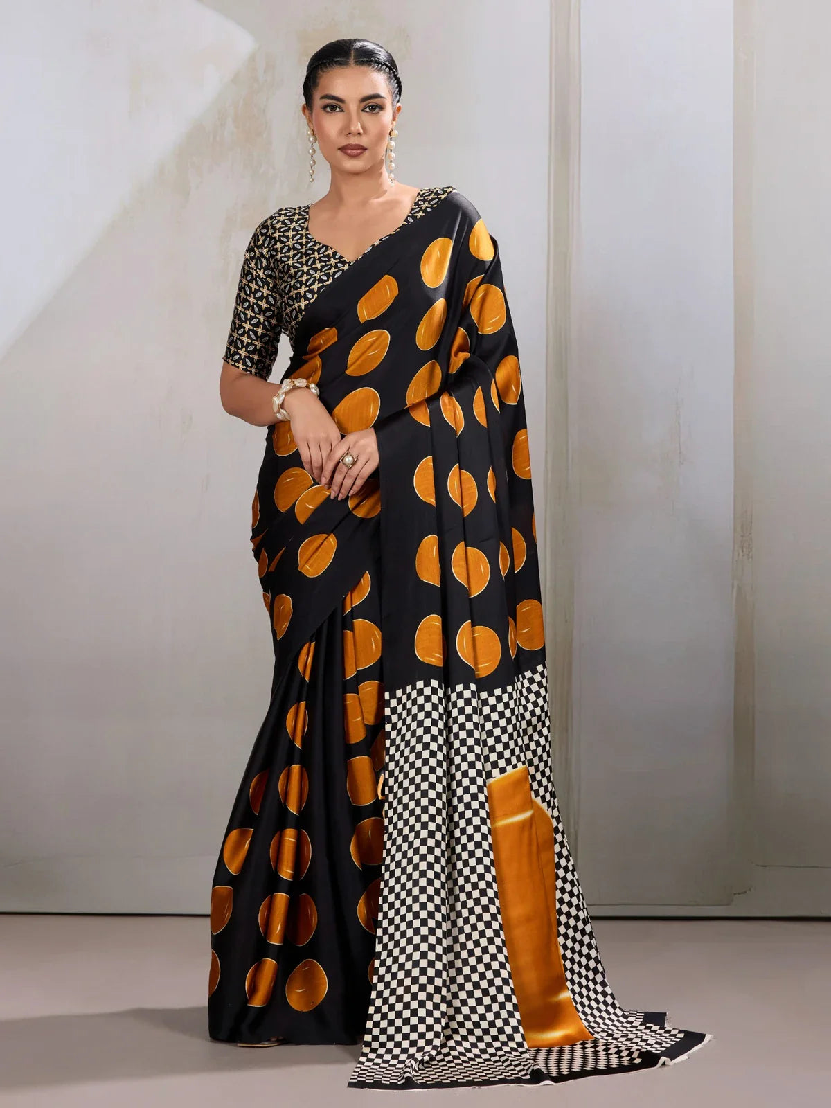Tarani modal satin black saree with golden polka dots and contrast blouse full view