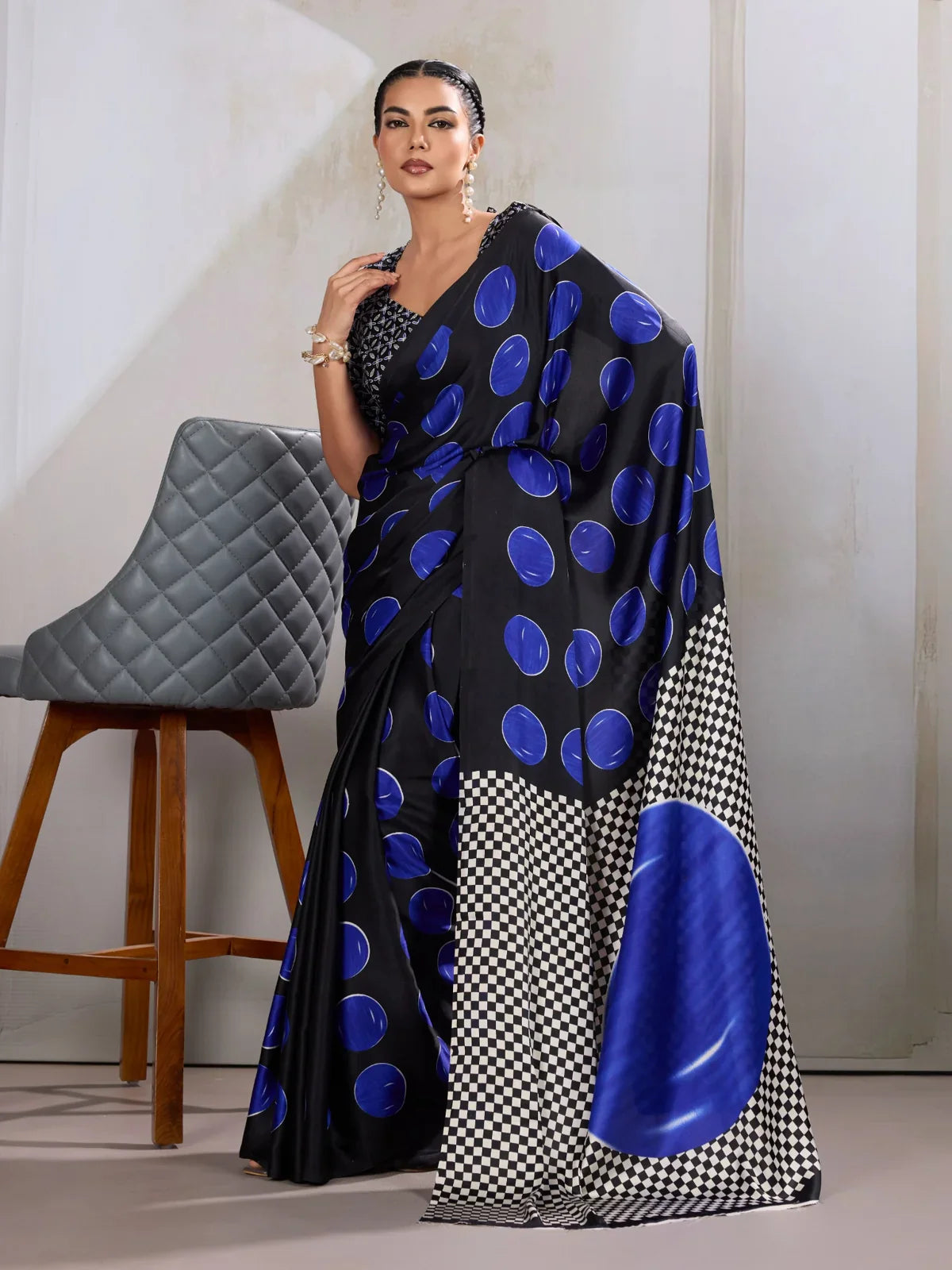 Tarani modal satin black saree with large blue dot motifs and checkered pallu in full front view