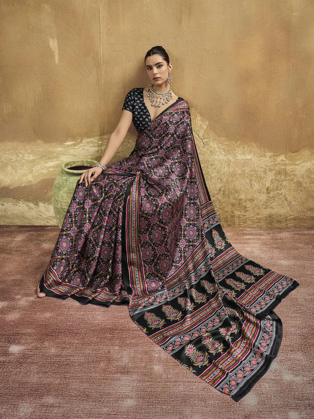 Tarani black printed Modal Satin saree pallu view with elegant Ajrakh border