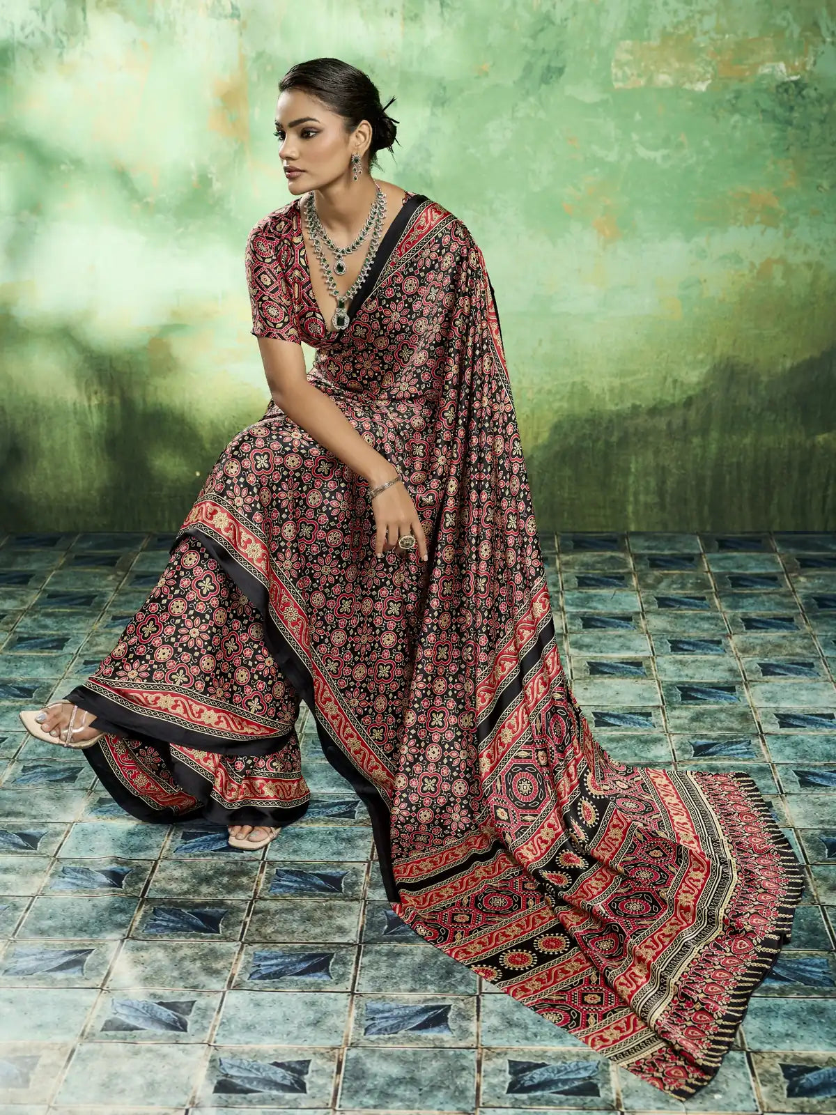 Tarani black Ajrakh print modal satin saree pallu view with elegant border detailing