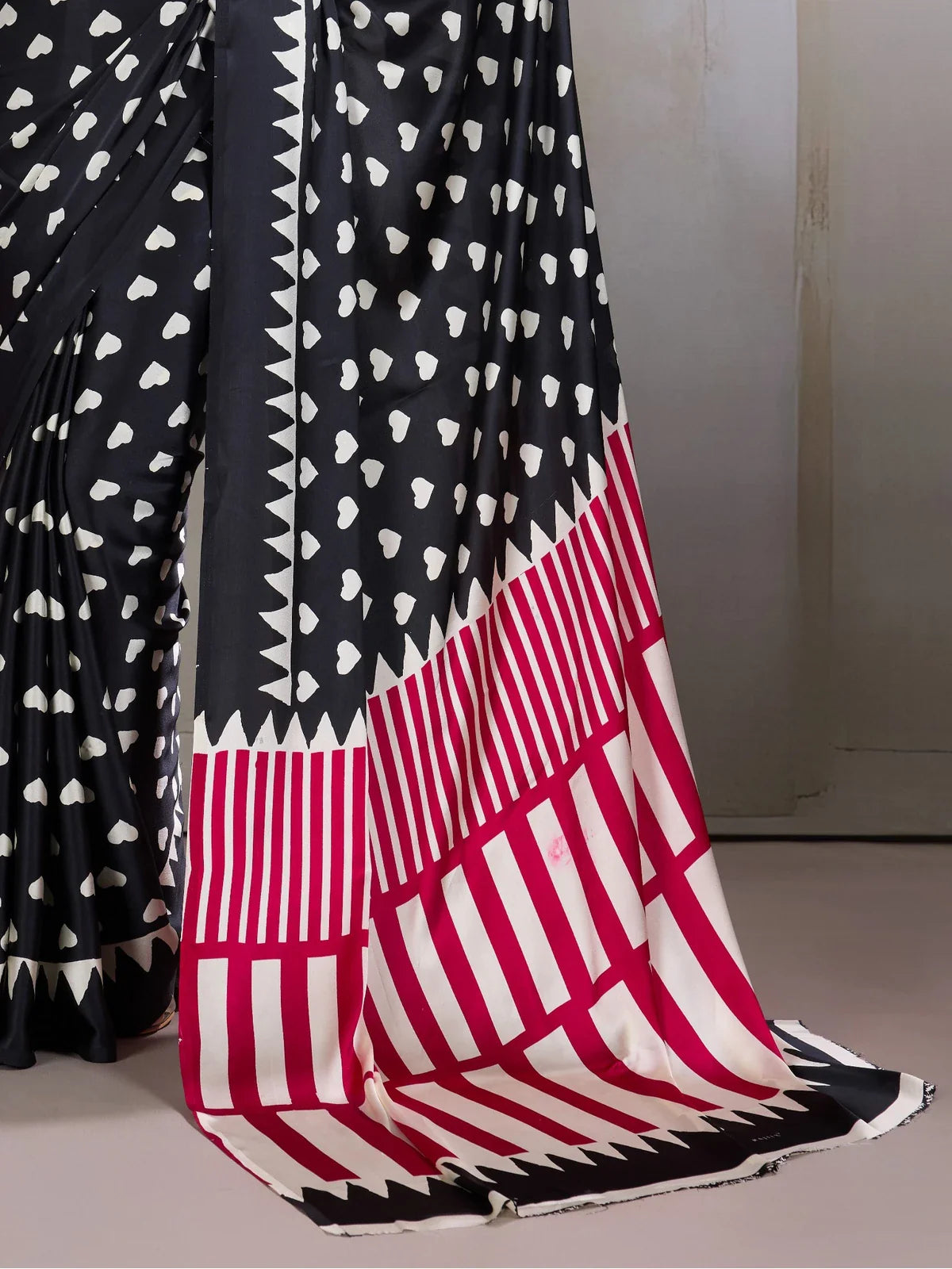 Tarani modal satin saree with contrast magenta and ivory pallu focus back view