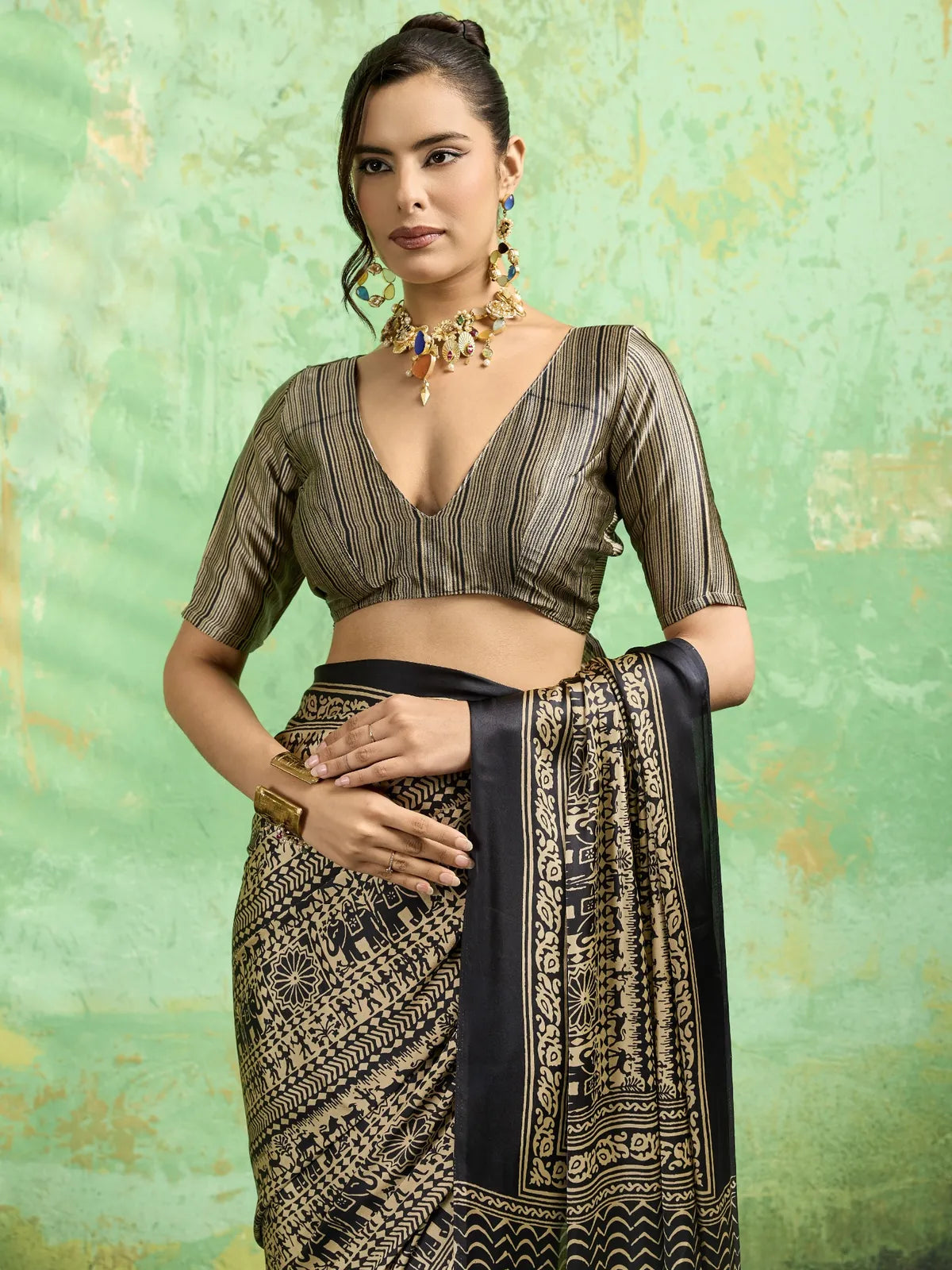 Tarani black Modal Satin Ajrakh Print saree upper body view showing blouse and border
