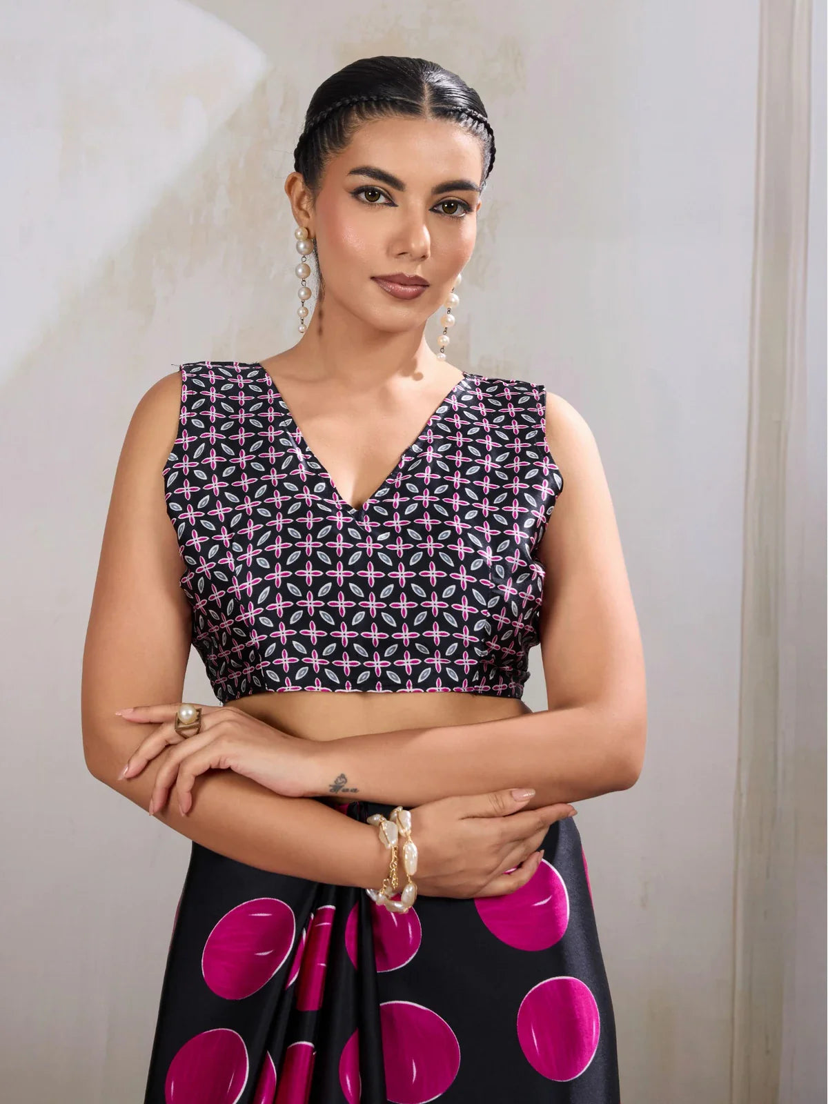 Tarani modal satin saree upper body view with geometric black and pink ajrakh blouse