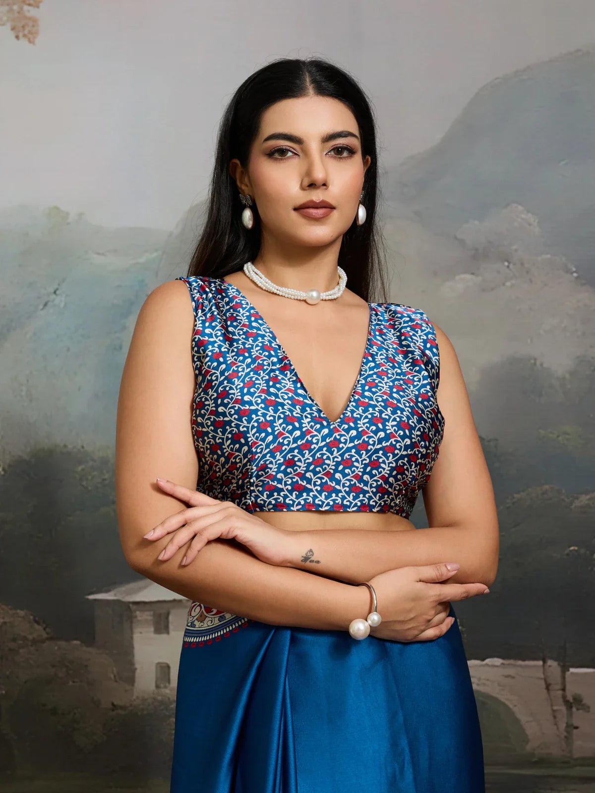 Tarani printed blouse close-up with blue and red Ajrakh floral design on modal satin