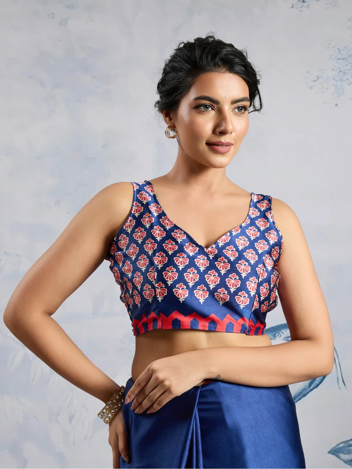 Tarani blouse closeup view of blue modal satin saree with red ajrakh print design