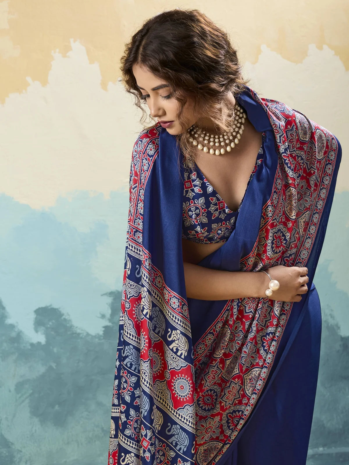 Tarani modal satin Ajrakh print saree closeup view with rich traditional detailing