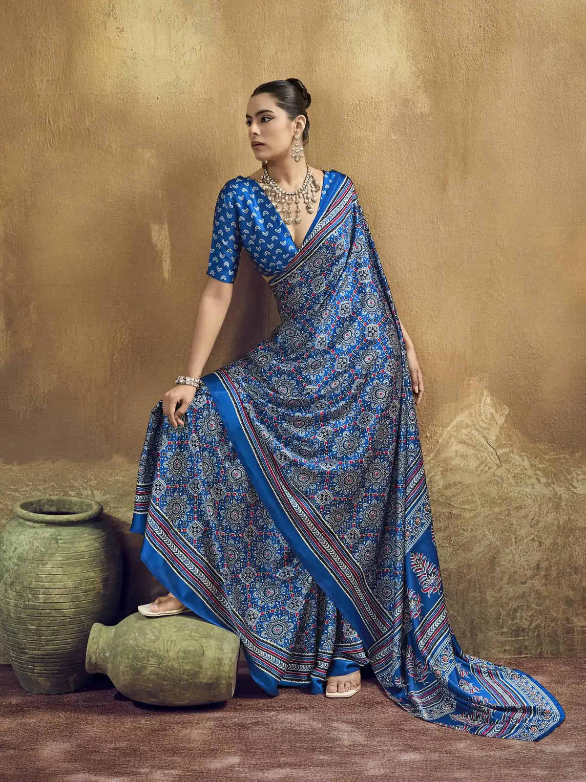 Tarani blue modal satin Ajrakh saree front pose with printed border and festive drape styling