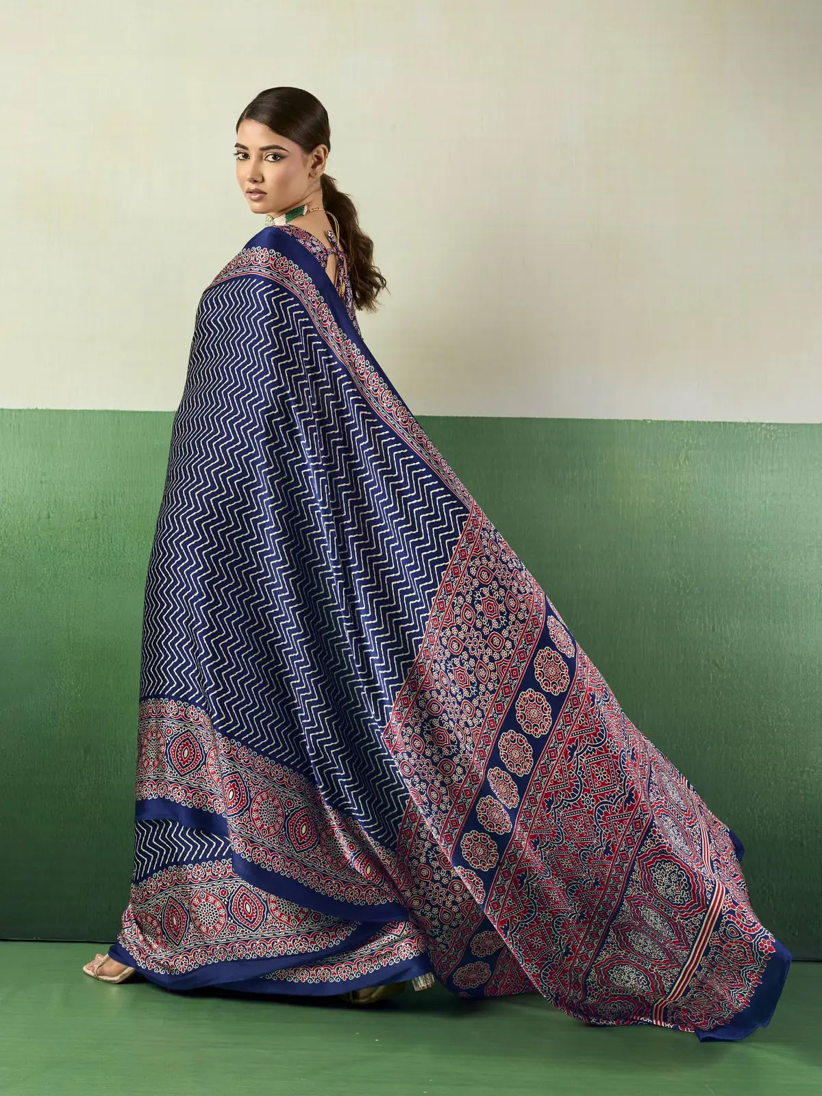 Tarani blue Ajrakh print modal satin saree front pose with detailed drape