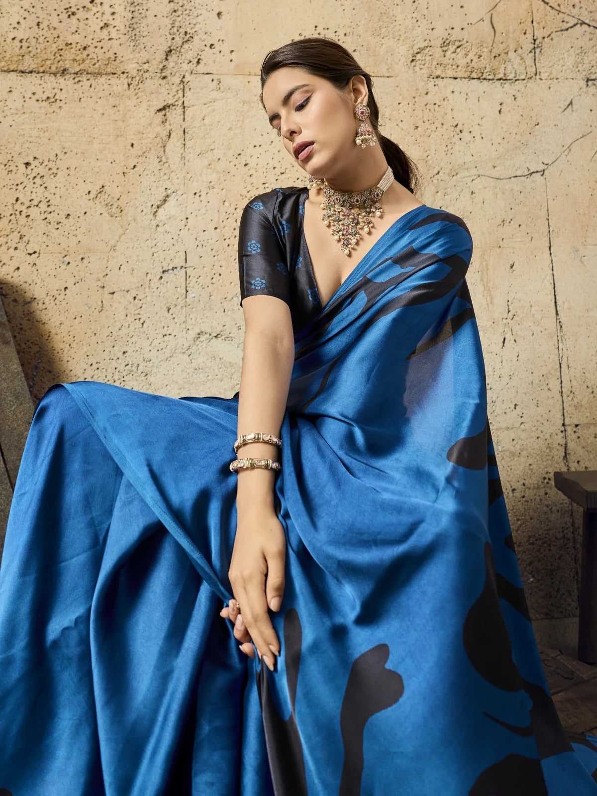 Tarani blue modal satin saree side pose with elegant Ajrakh print detailing