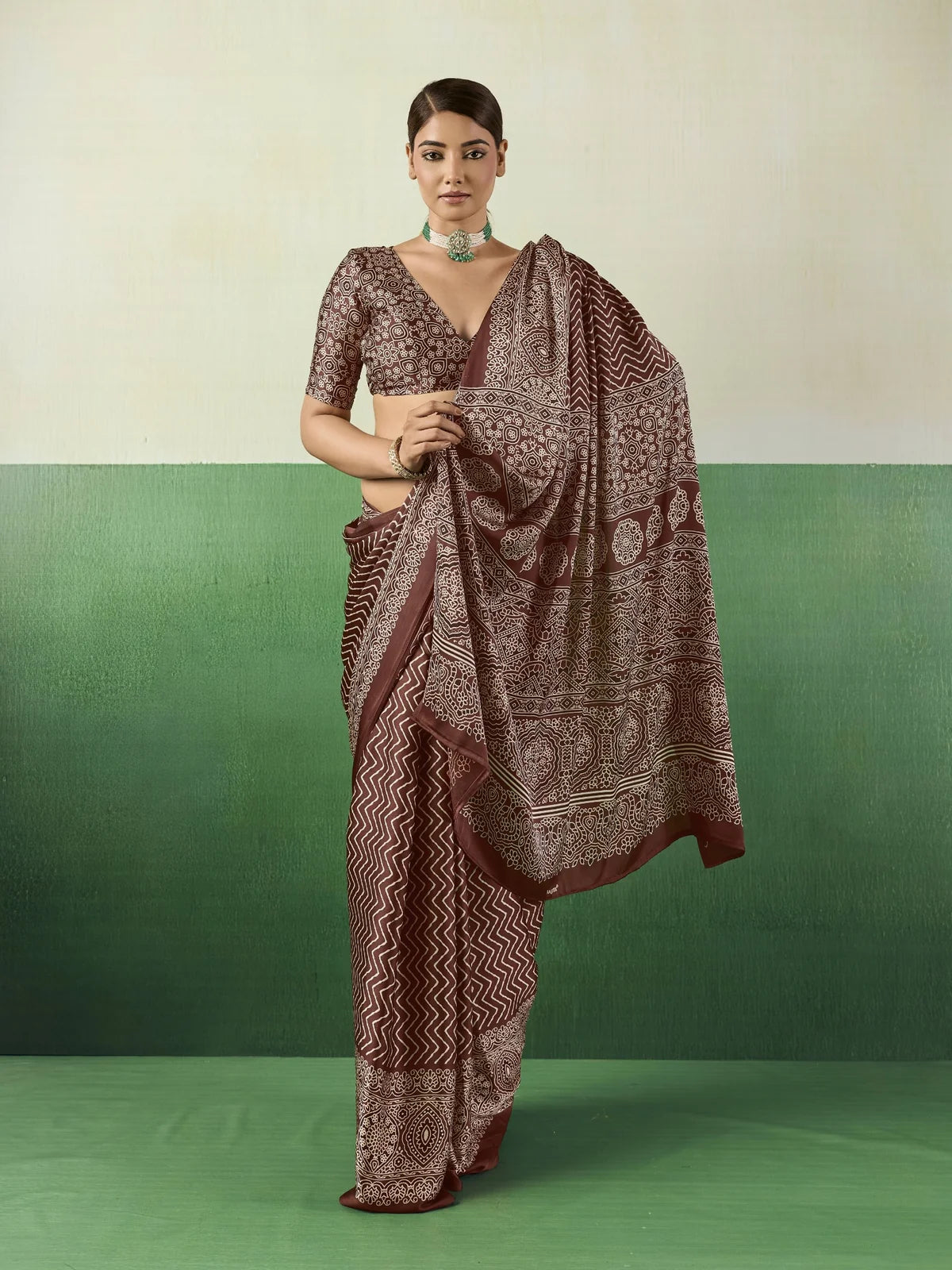 Tarani modal satin brown Ajrakh saree front view with graceful pallu and printed blouse