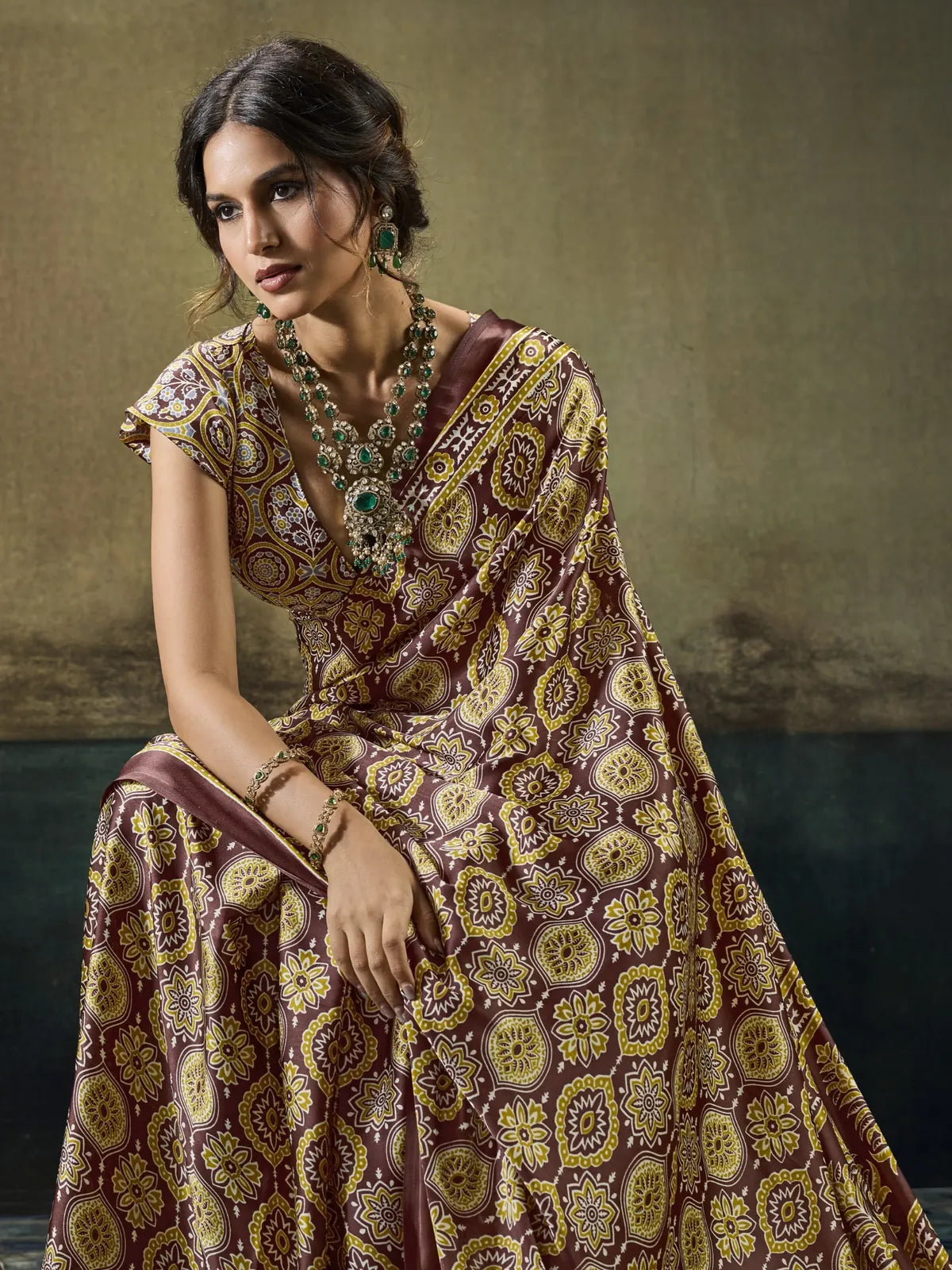 Tarani Aishwika brown Modal Satin Ajrakh print saree side view with graceful printed drape