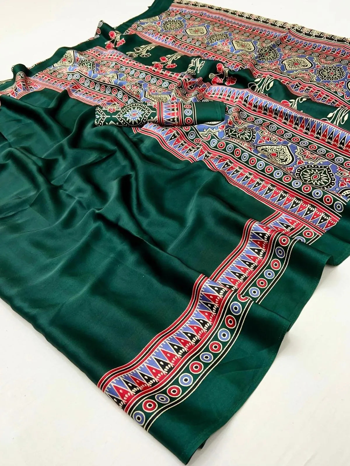 Tarani fabric close-up of modal satin saree with ajrakh and tribal inspired detailing