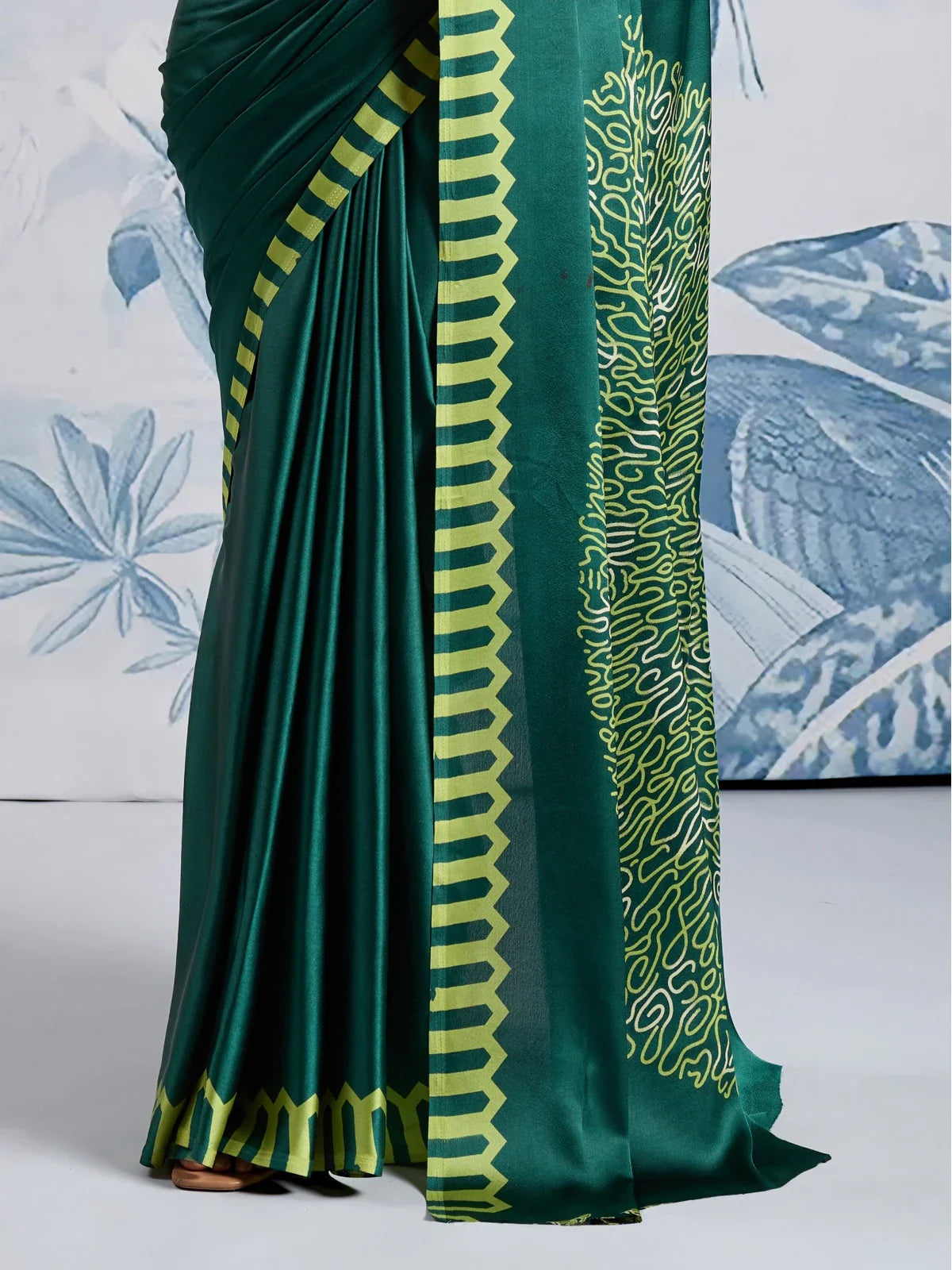 Tarani modal satin saree border and pleats close-up with designer detail