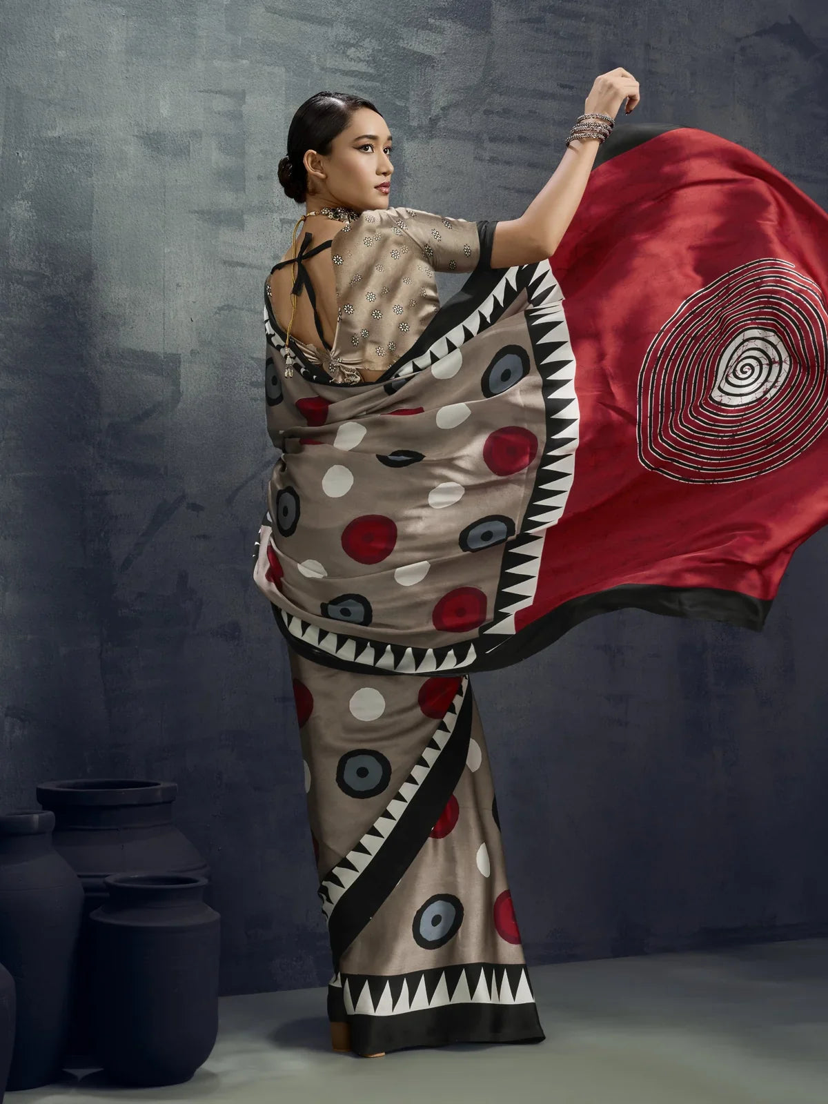 Tarani grey saree back view with bold ajrakh circle prints and open-back blouse design