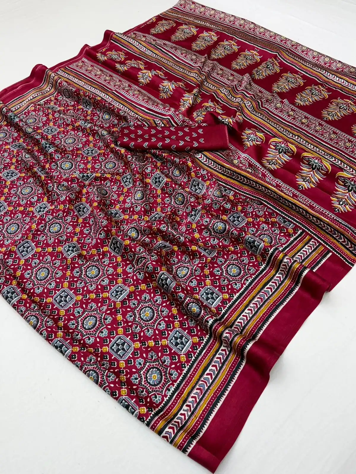 Tarani magenta modal satin Ajrakh print saree closeup view showing fabric detailing
