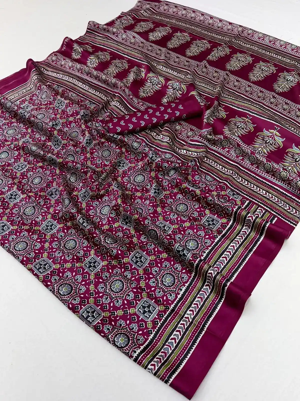 Tarani modal satin Ajrakh print saree closeup view with detailed traditional motifs