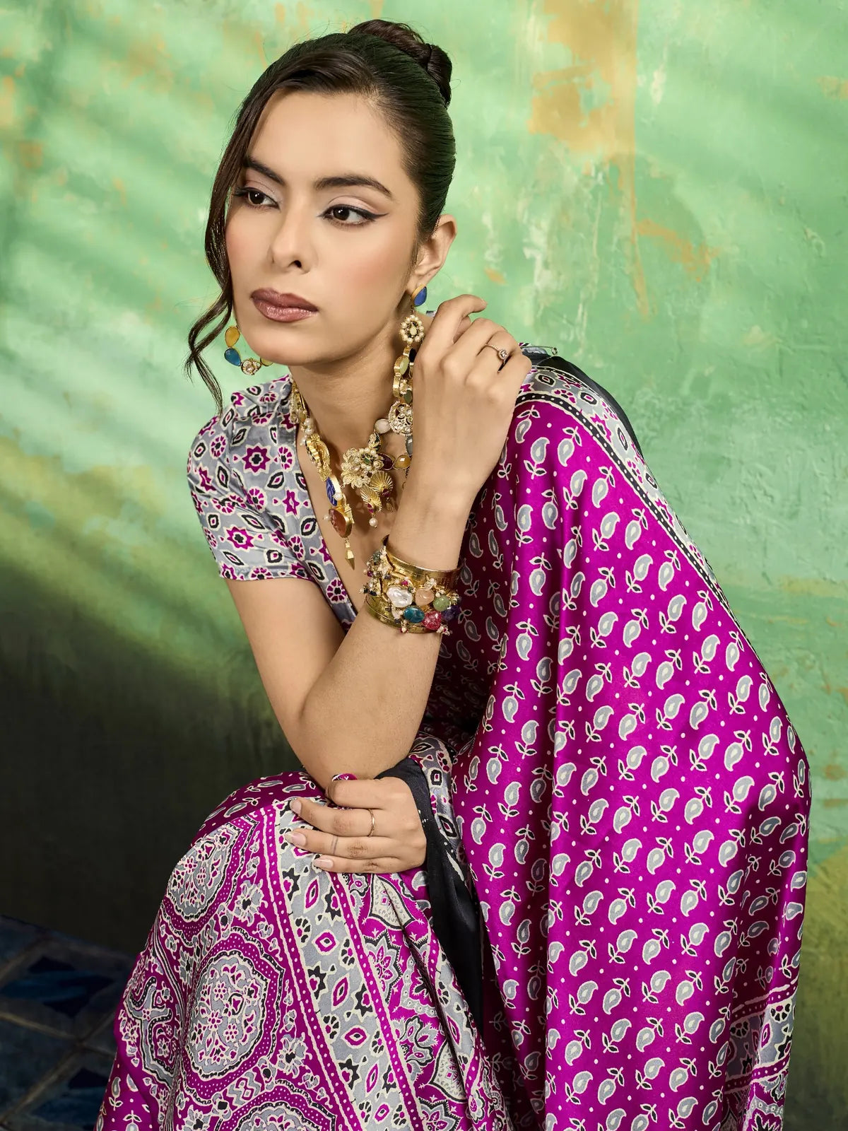 Tarani magenta Ajrakh print saree closeup showcasing border detailing and printed blouse design