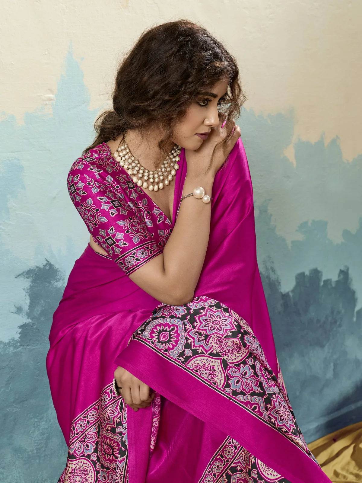 Tarani modal satin Ajrakh print saree closeup view with rich ethnic print and soft drape