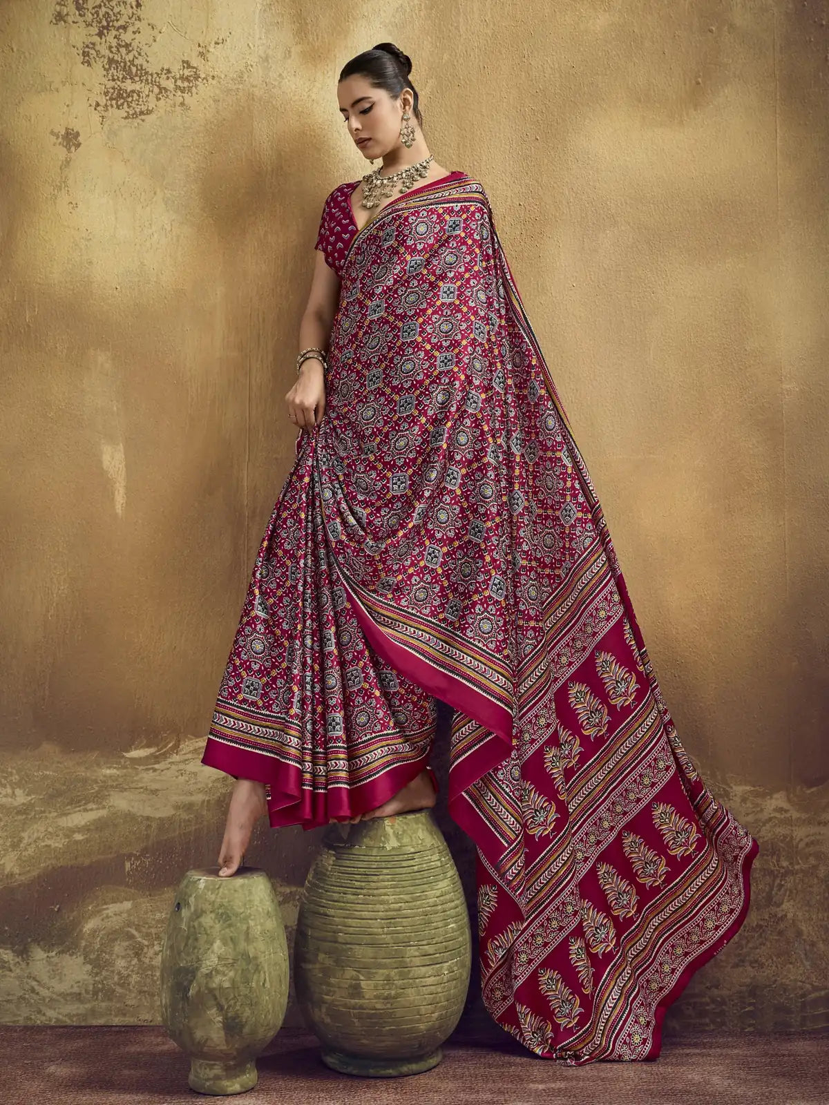 Tarani magenta modal satin Ajrakh print saree side view with flowing pallu styling