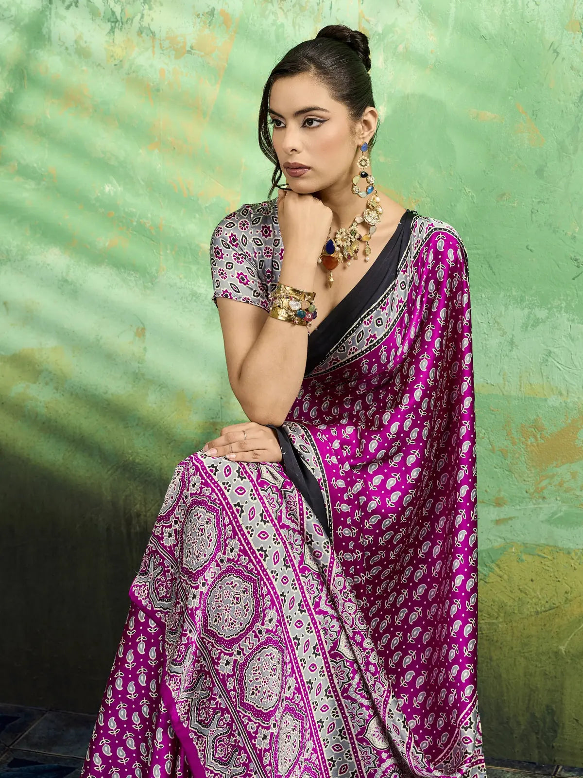 Tarani designer modal satin Ajrakh saree side pose with rich pallu and elegant border work