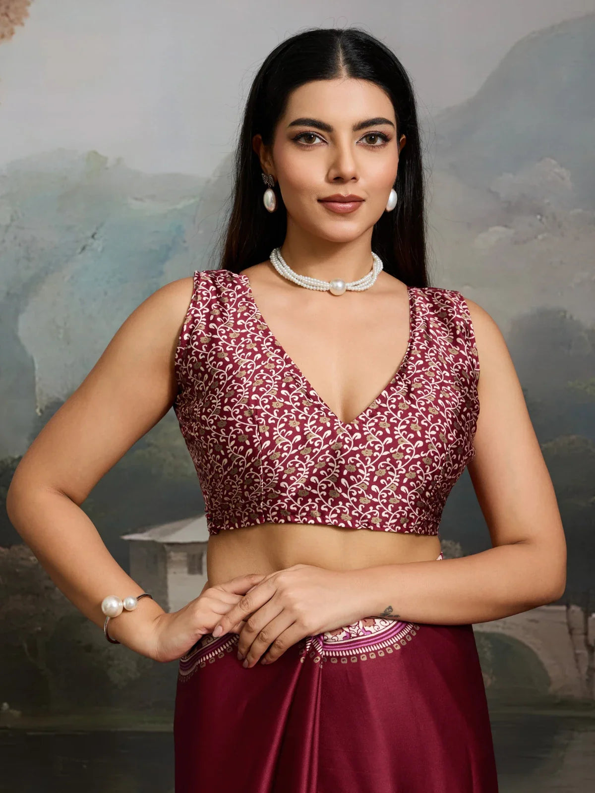 Tarani close-up view of blouse in maroon Ajrakh print with elegant neckline and sleeve design