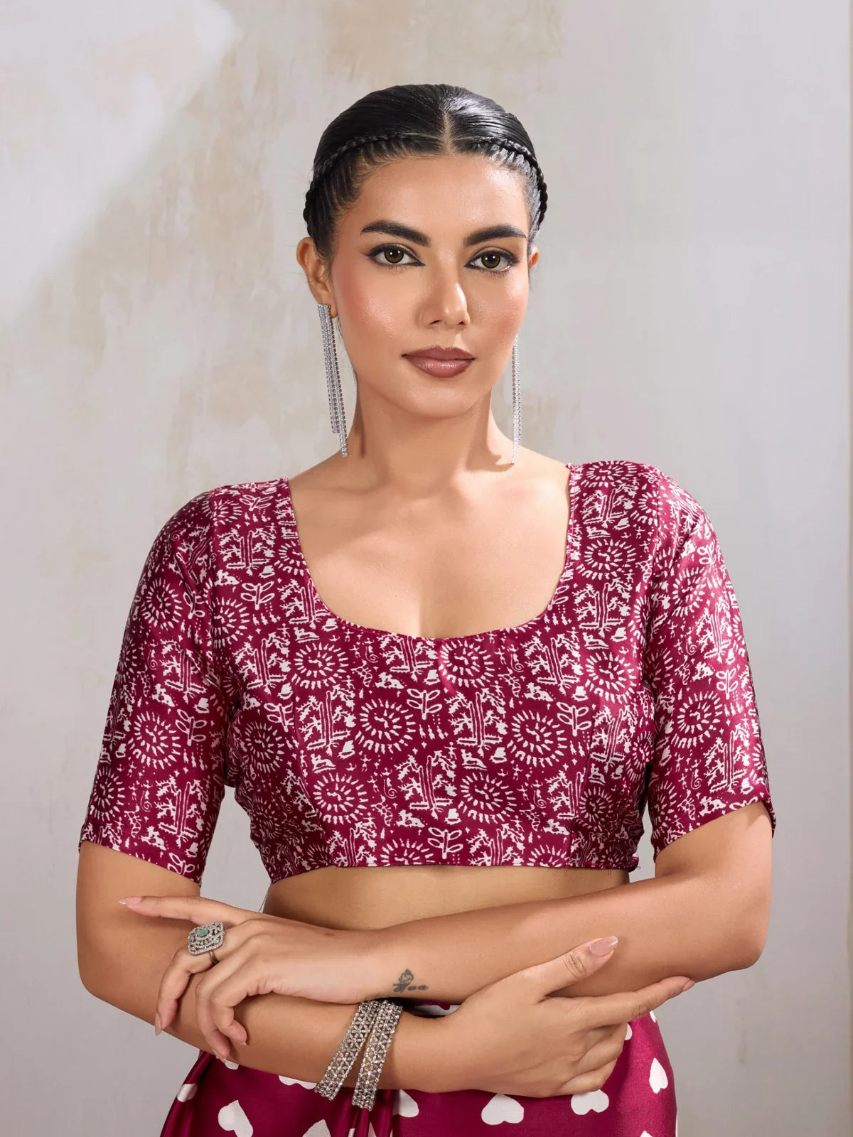 Tarani blouse close-up with maroon printed fabric and deep neckline
