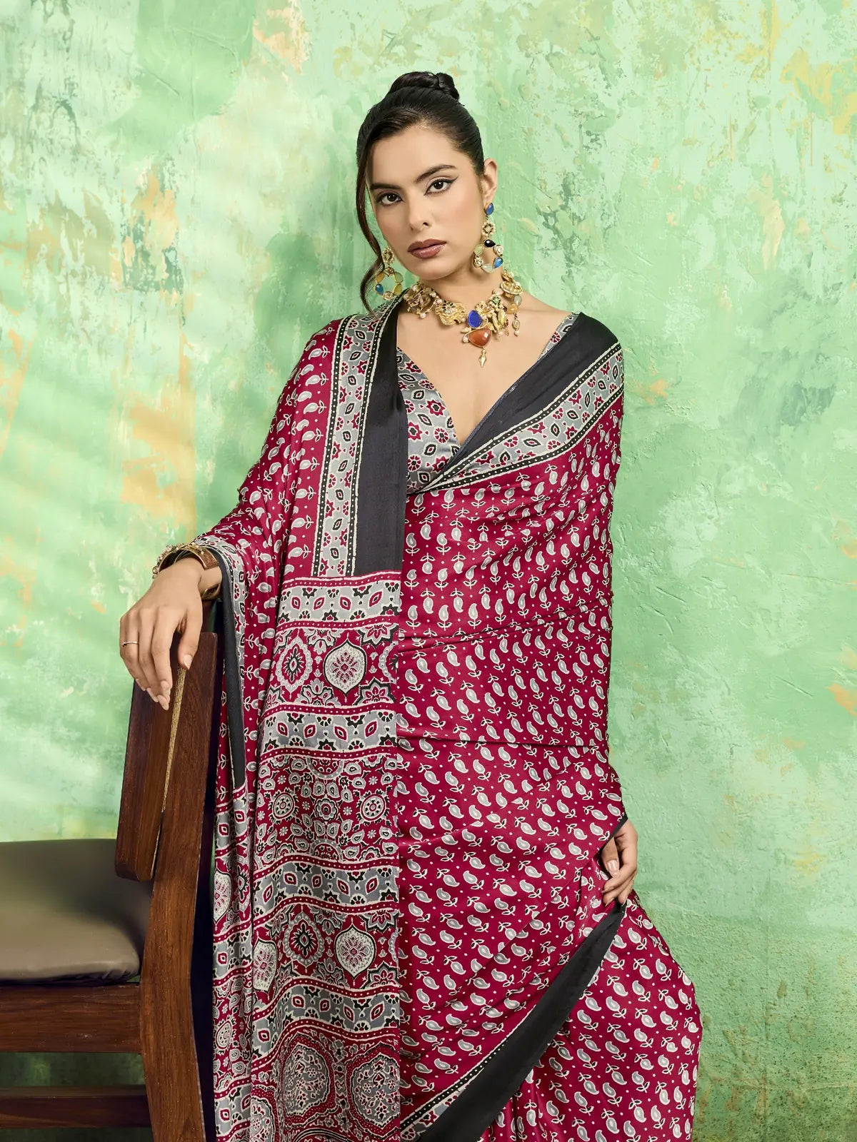 Tarani maroon modal satin Ajrakh print saree closeup view with Ajrakh border detailing