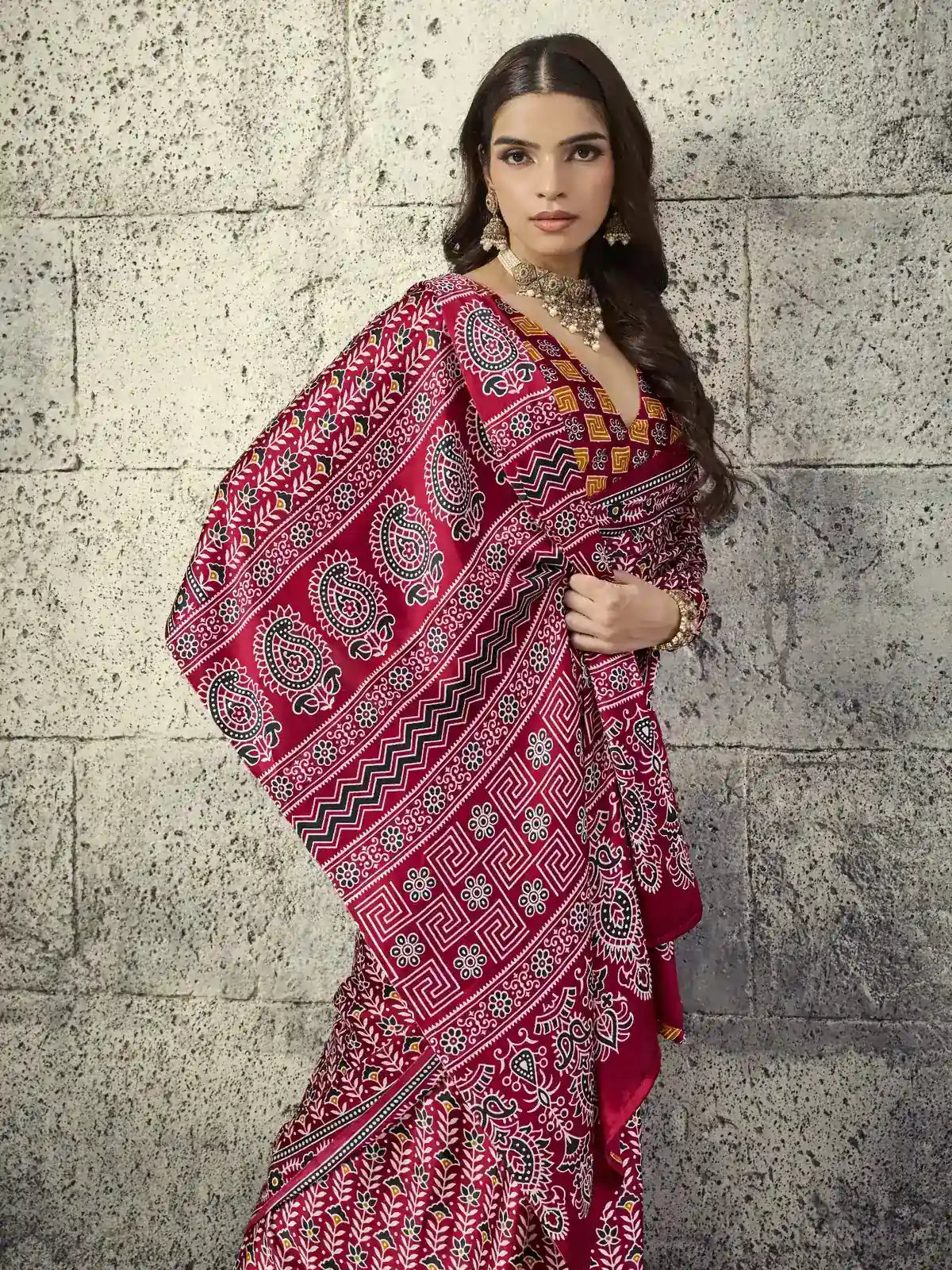 Tarani maroon Ajrakh printed saree pallu view with intricate border and traditional patterns