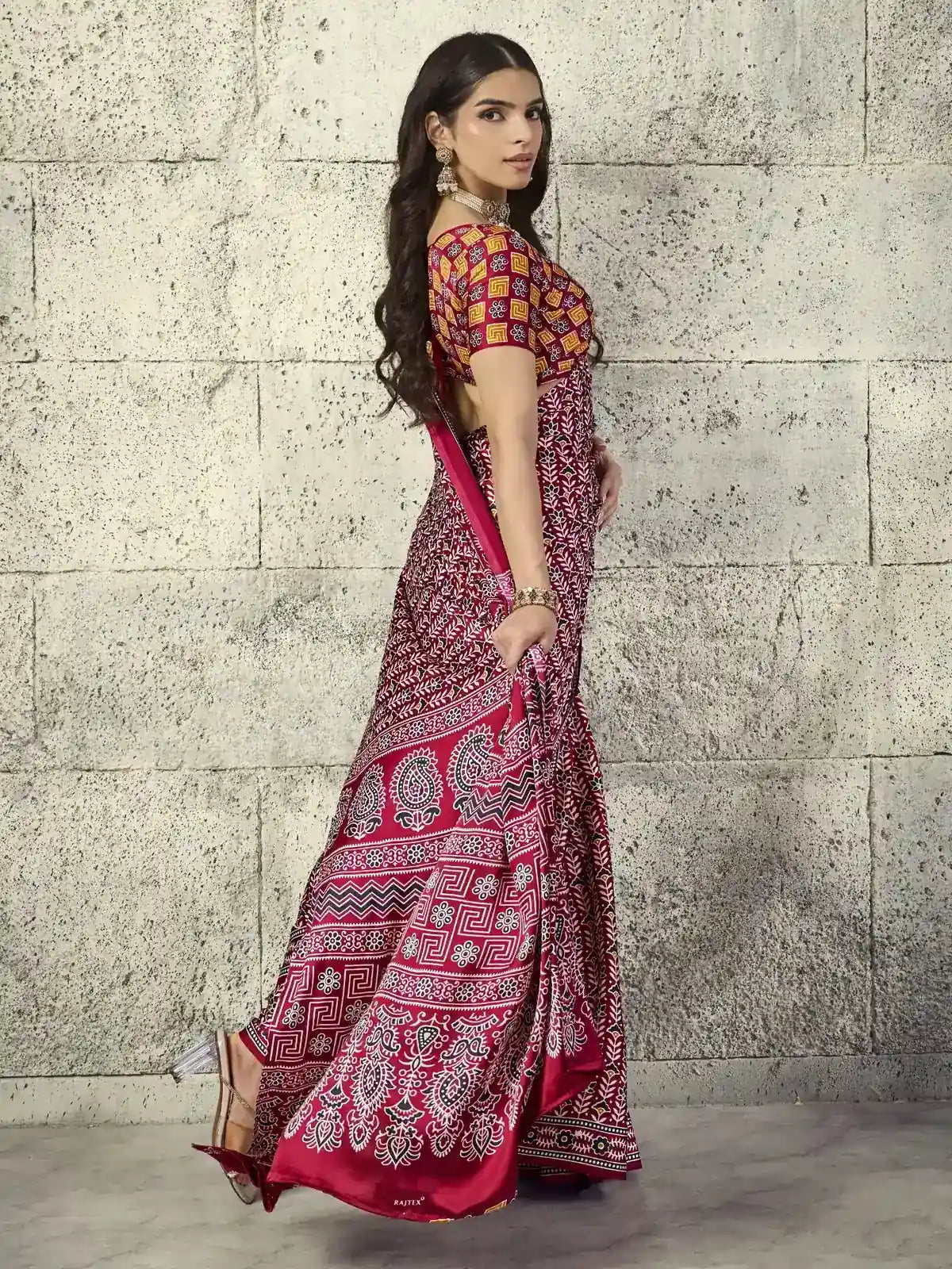 Tarani maroon Modal Satin Ajrakh Saree side view showcasing elegant drape and border