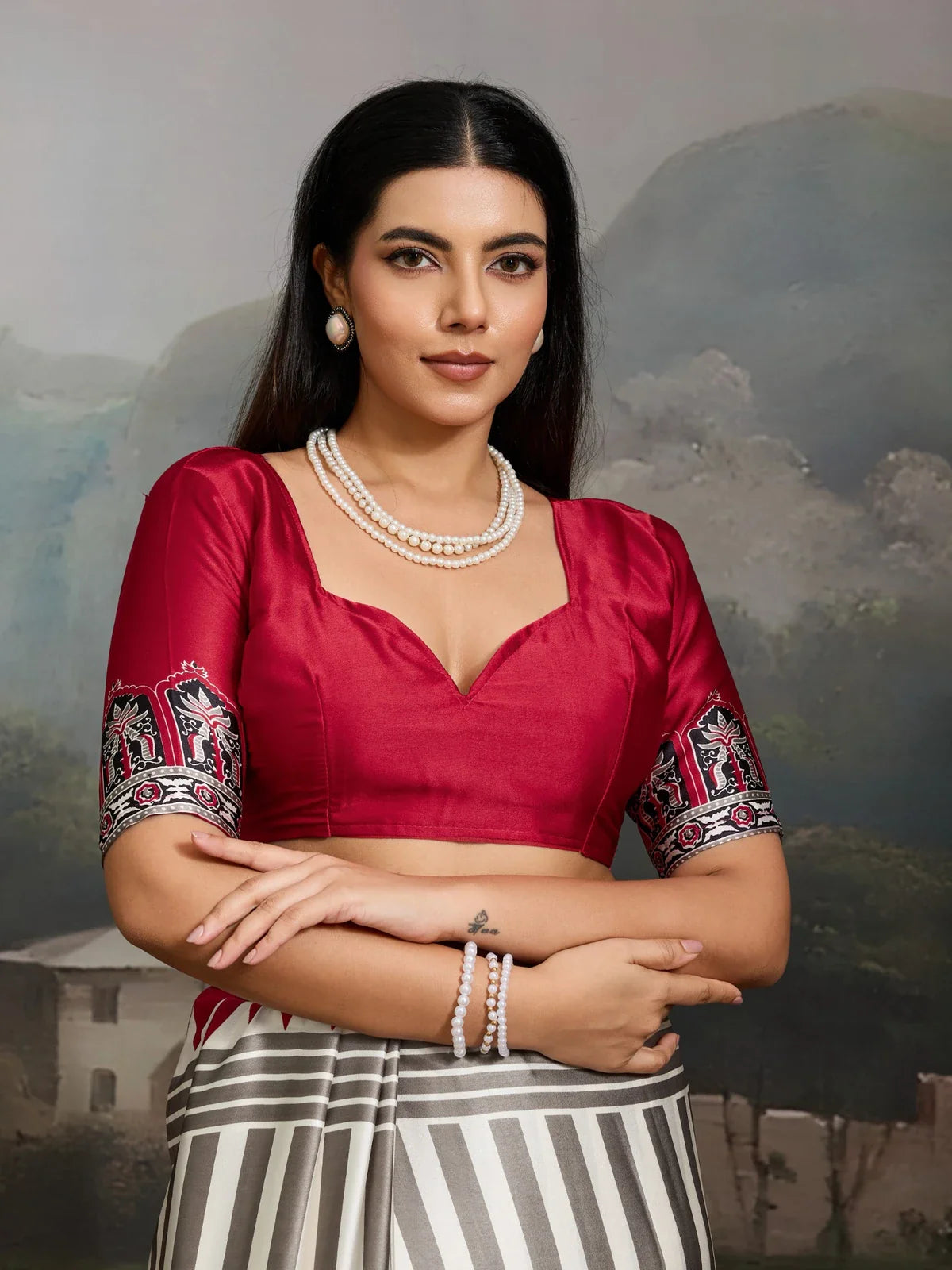 Tarani Modal Satin maroon saree upper body view showing designer blouse and embroidery