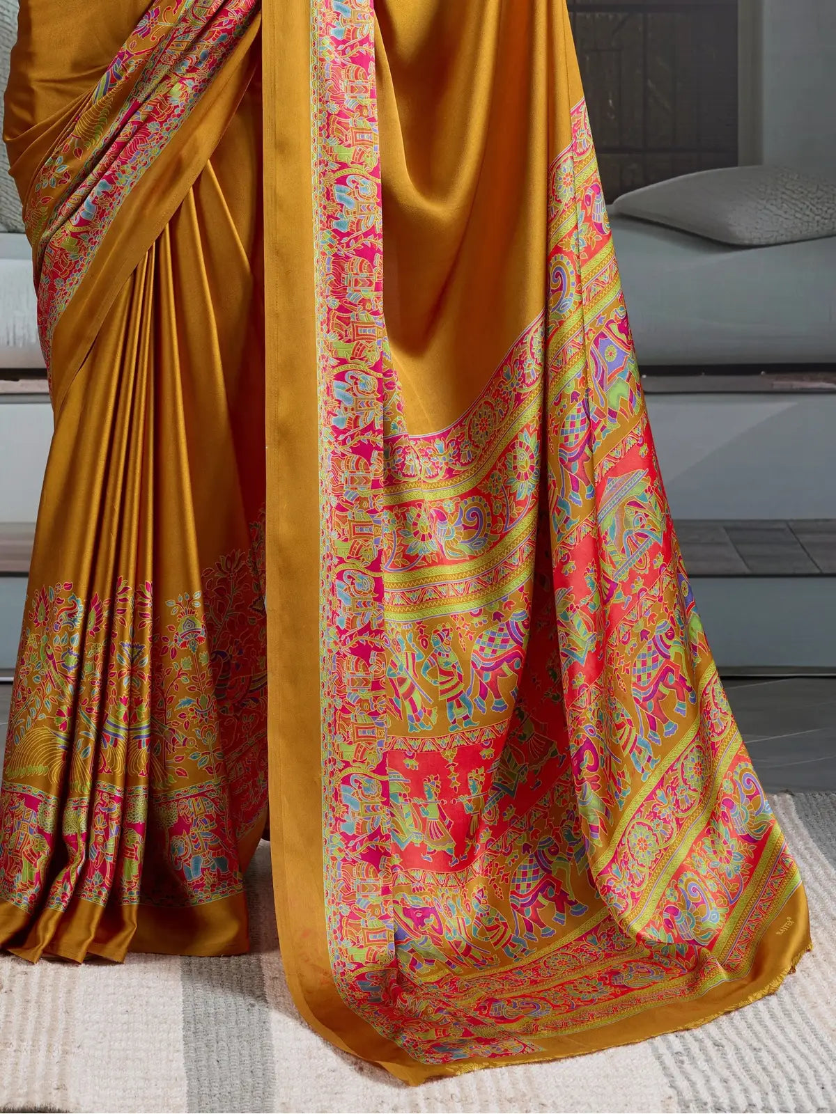 Tarani mustard saree pallu and border in vibrant multicolor detailing