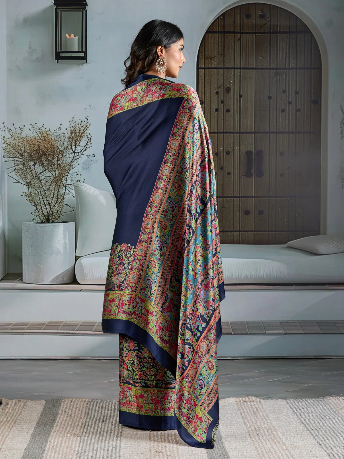 Back view of Tarani modal satin saree with Ajrakh motifs and graceful fall