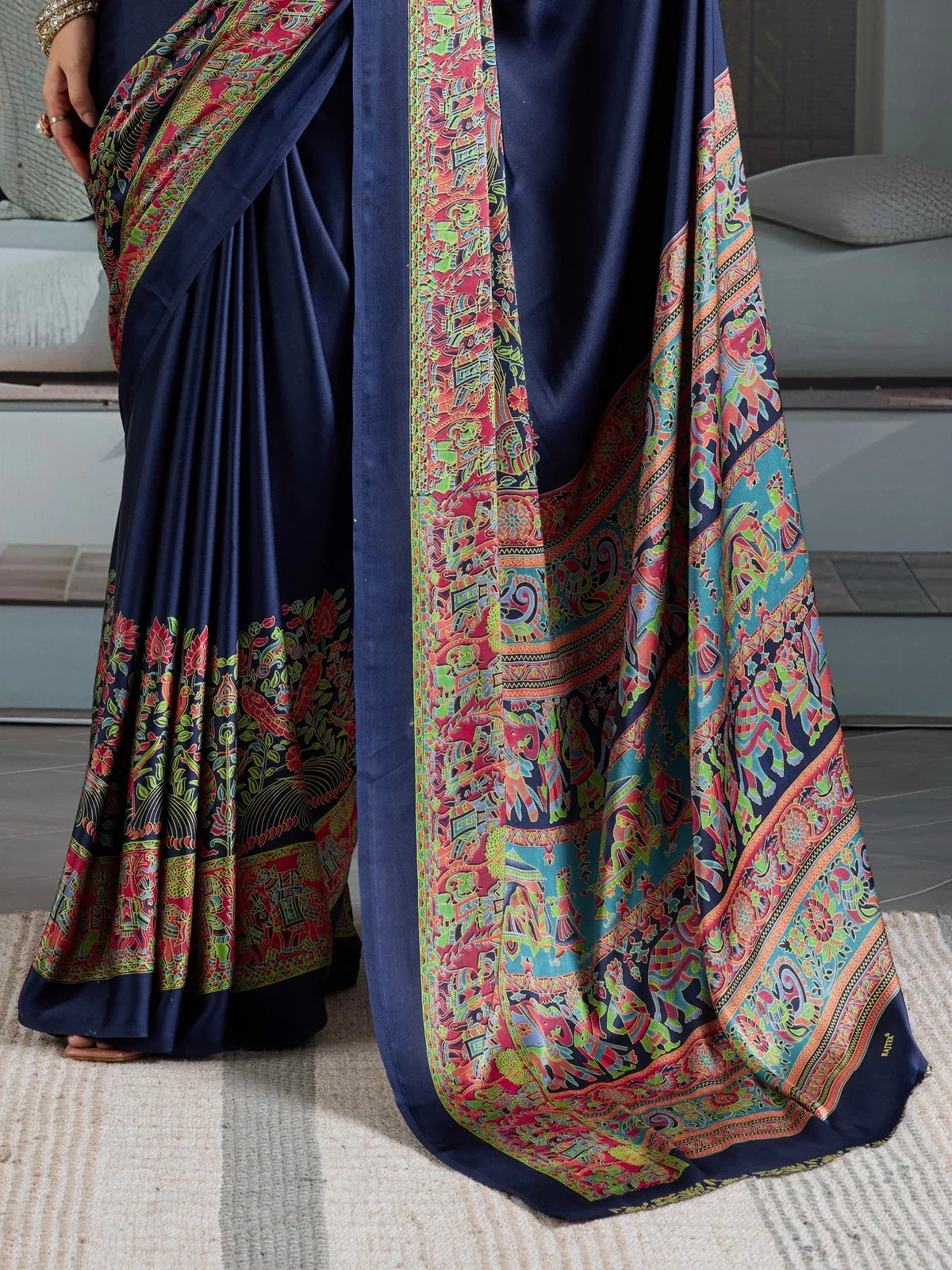 Tarani navy blue saree showing detailed pallu and border with Ajrakh artwork