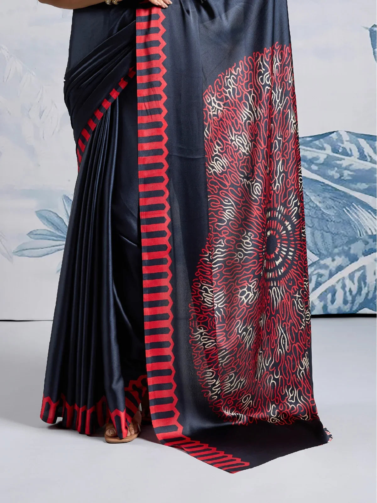 Tarani festive modal satin saree with vibrant mandala pattern on pallu and zigzag red border