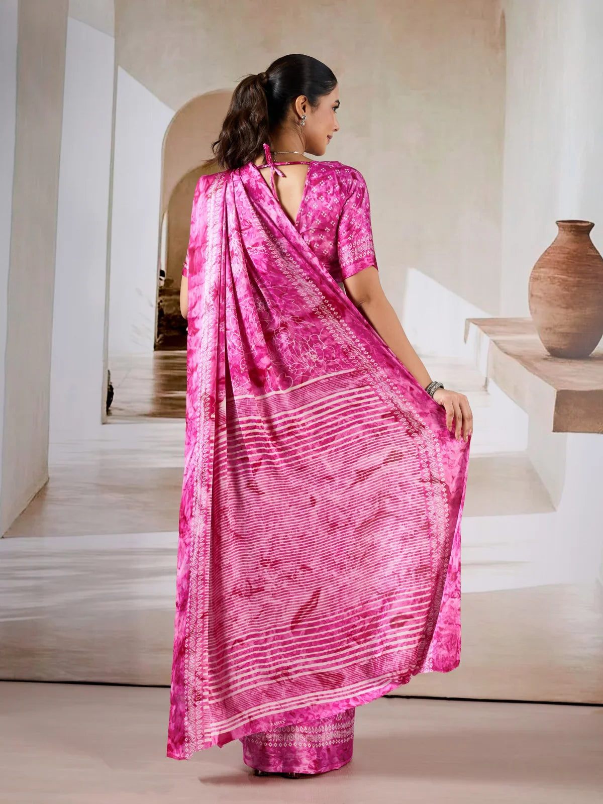 Back view of Tarani modal satin saree showcasing drape and fall