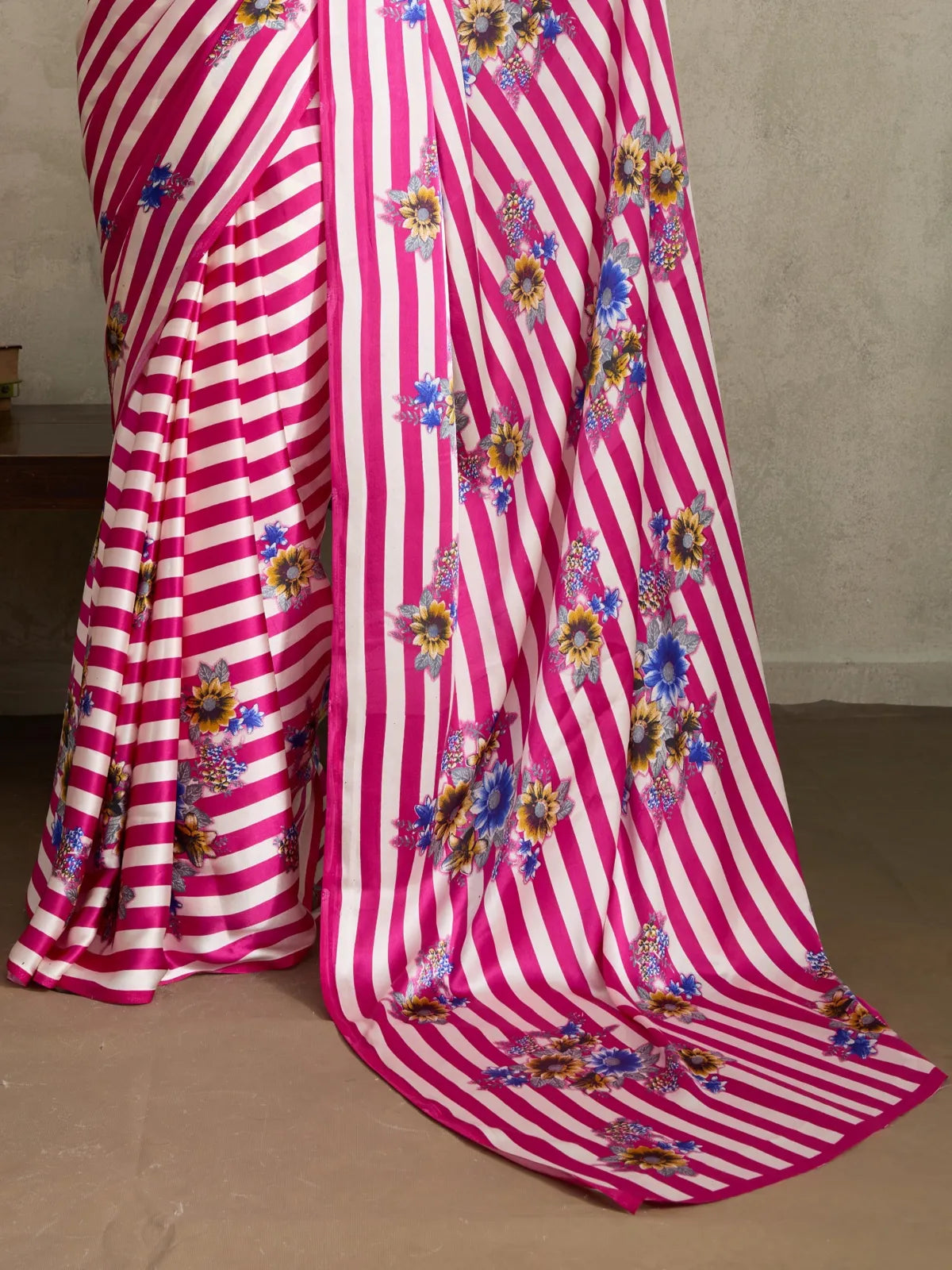 Tarani pink striped modal satin saree with detailed view of floral Ajrakh print fabric